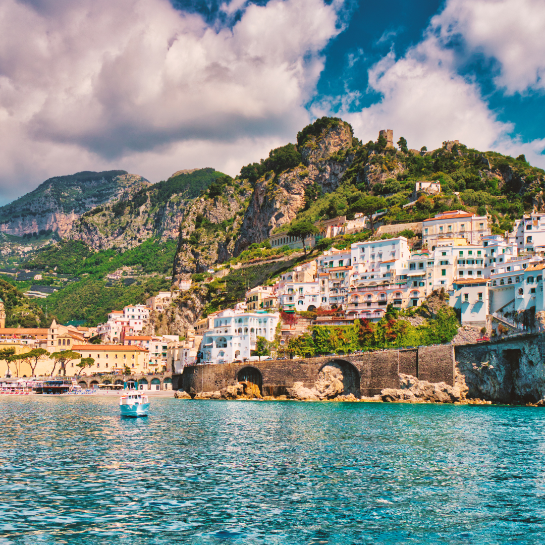 Colorful buildings on the cliffs above the sea in Amalfi, Italy