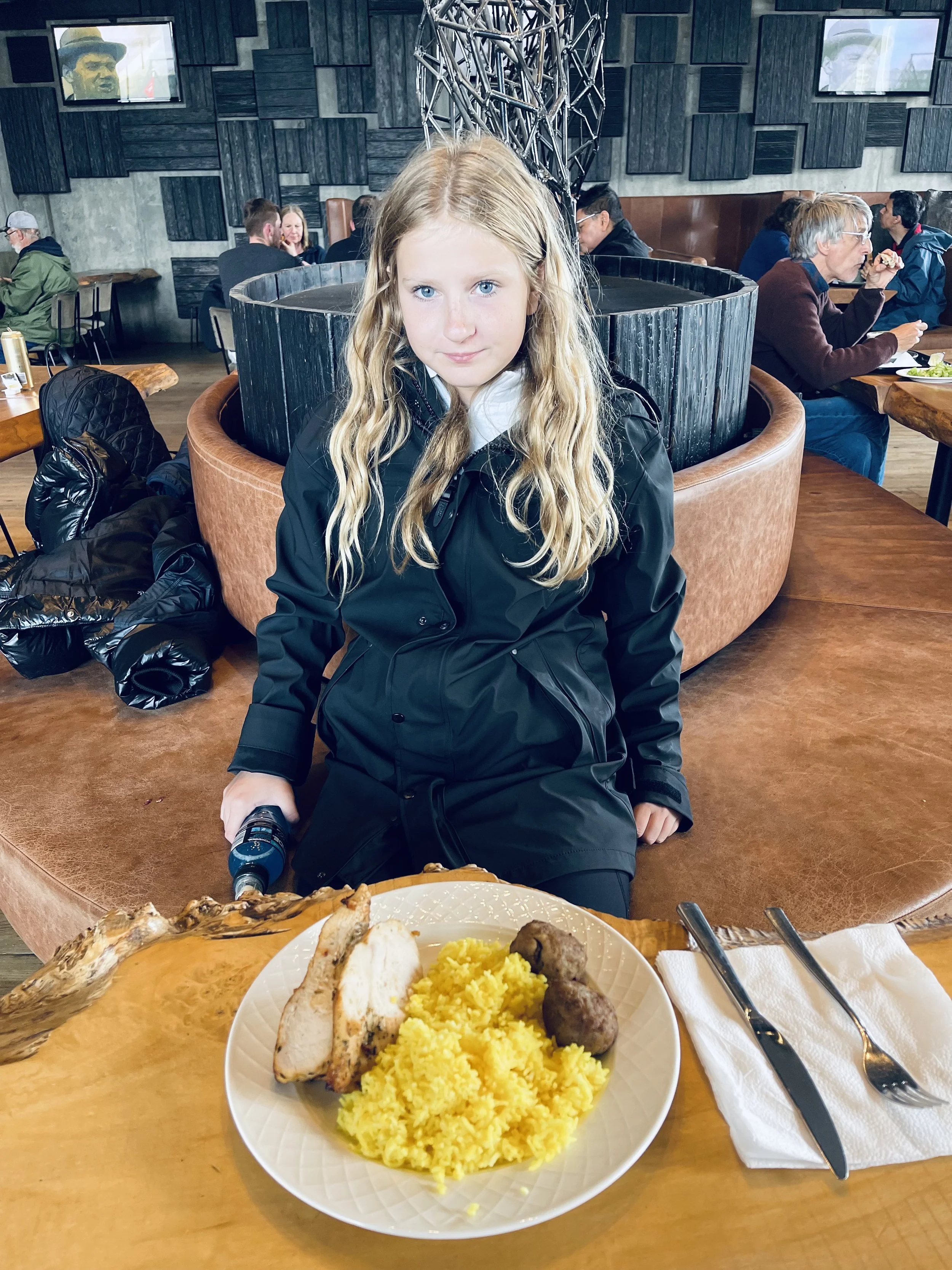 Jeanine’s daughter enjoying a restaurant meal during their Iceland trip