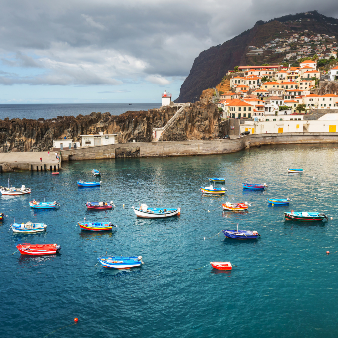 Colorful fishing boats in the harbor of Câmara de Lobos, Madeira