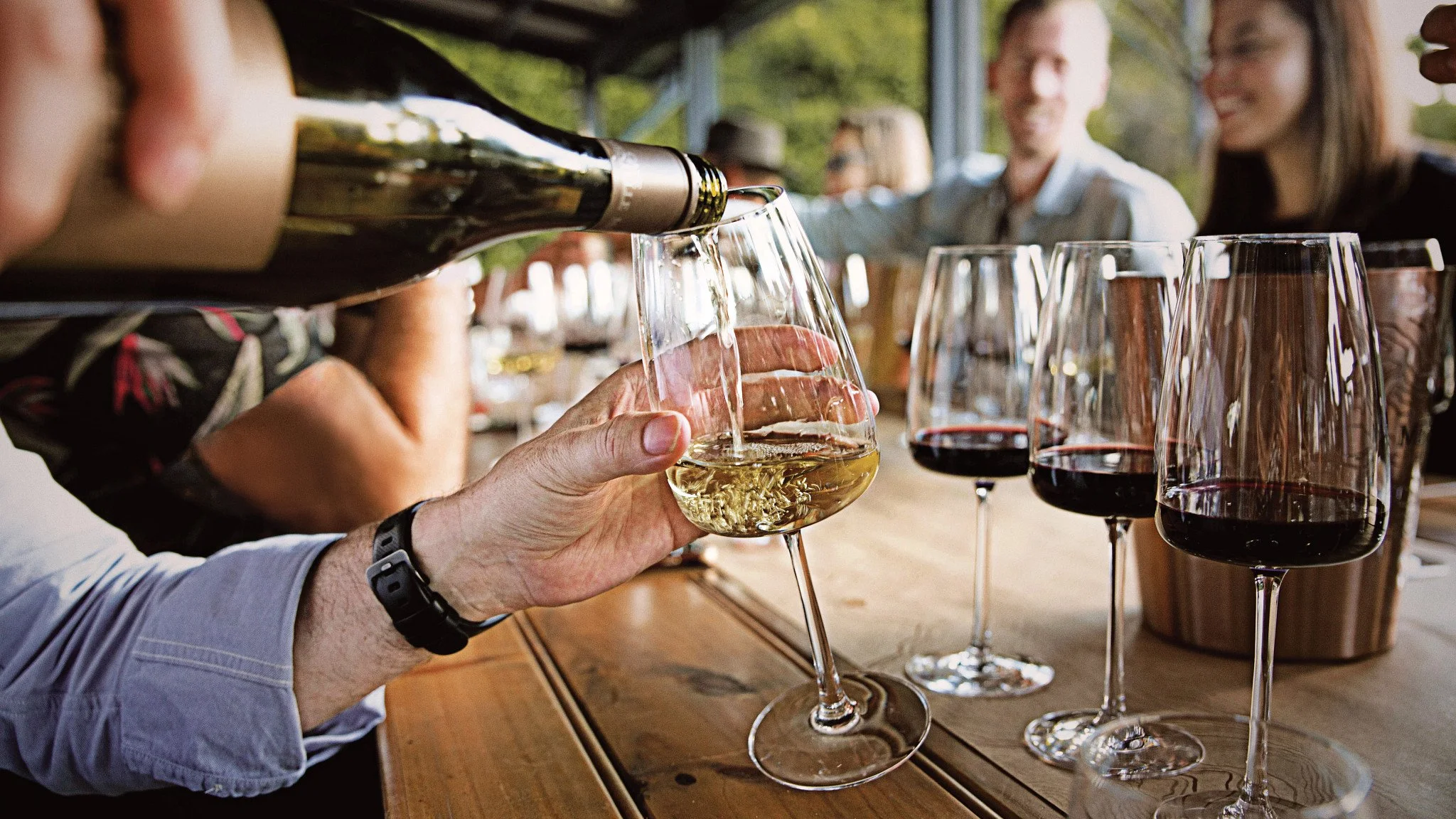 Travelers at a wine tasting on an AmaWaterways river cruise excursion