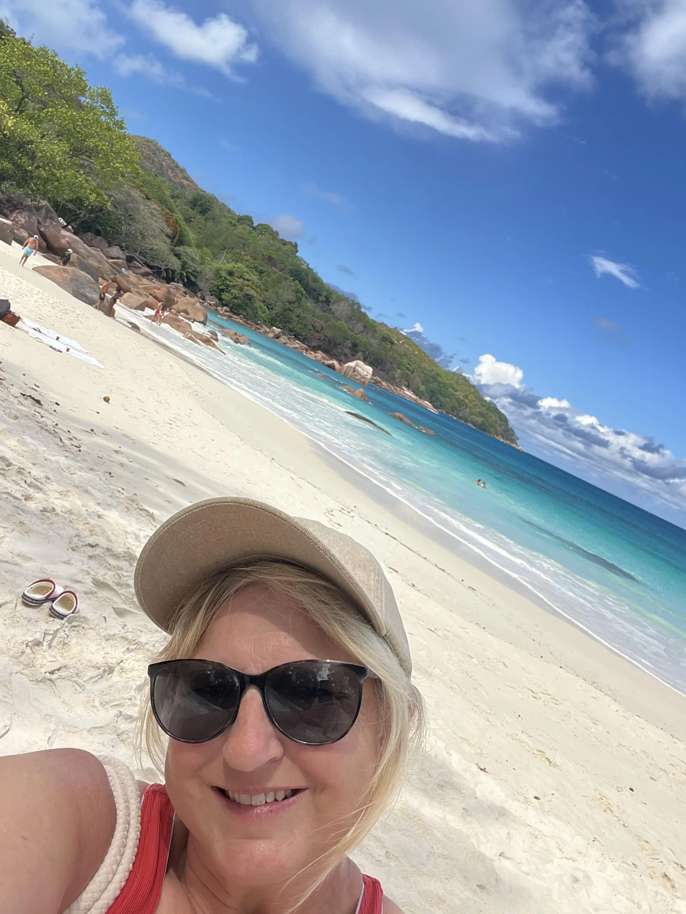 Jeanine Lavishly Travel Solo Trip Seychelles Africa White sand Beach Turquoise Water