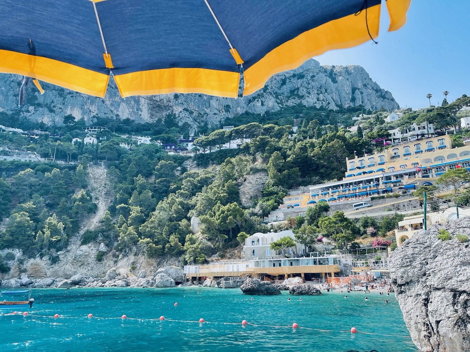 View of the Capri coastline and turquoise water from Jeanine’s Italy travels