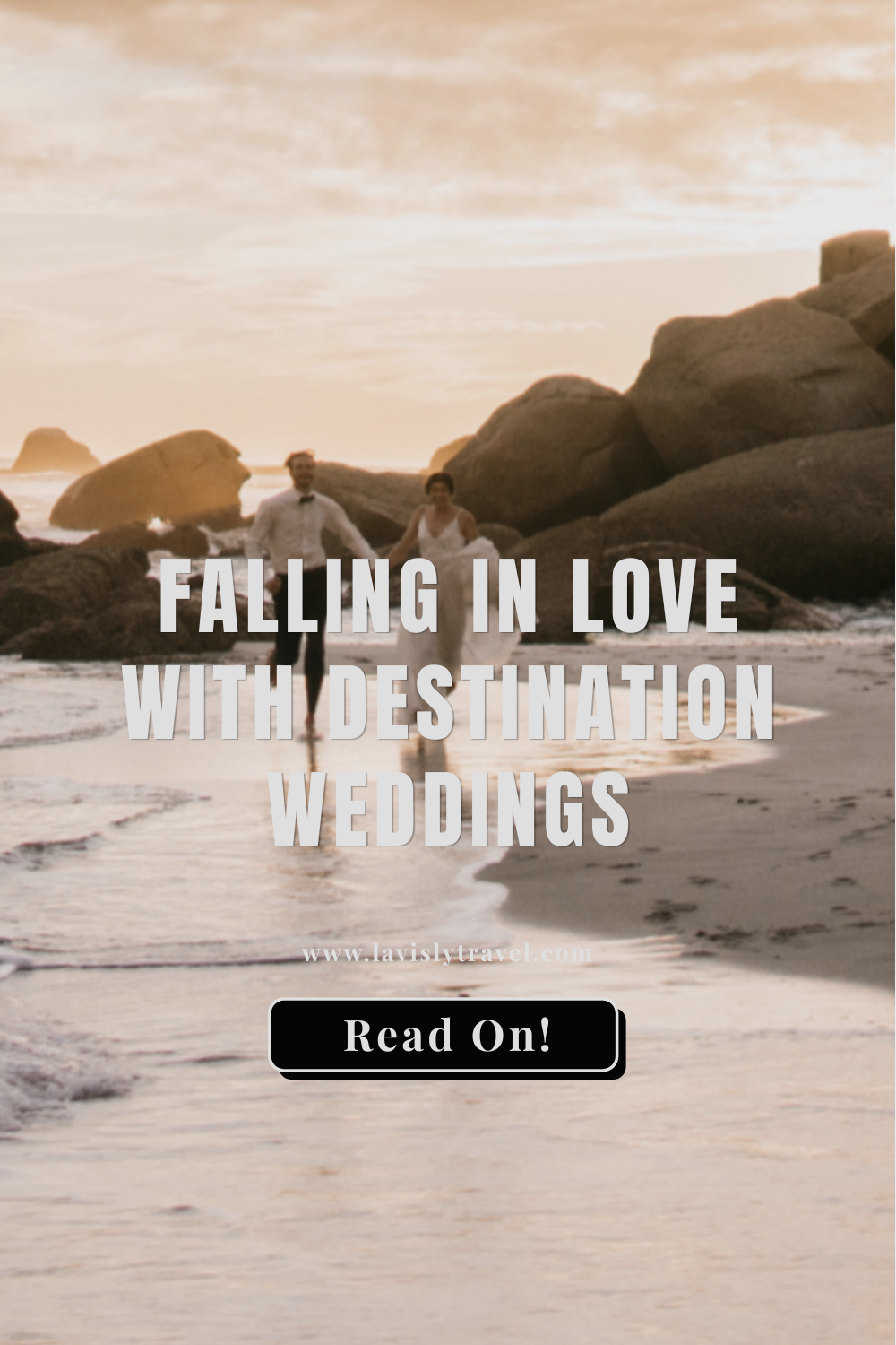 Newlywed couple running along a golden beach at sunset with dramatic rock formations in the background.