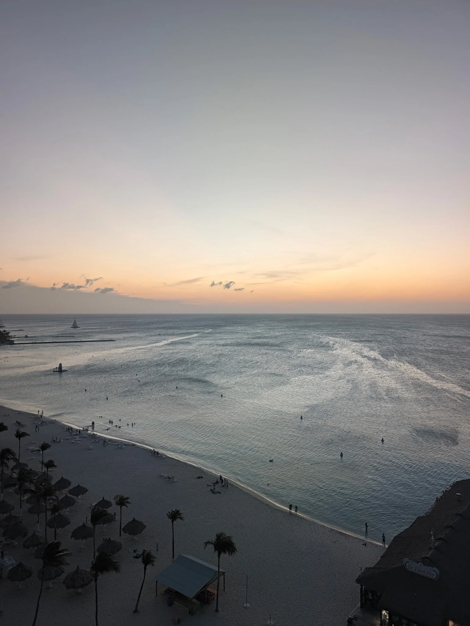 Golden sunset over the beach and Caribbean Sea in Aruba
