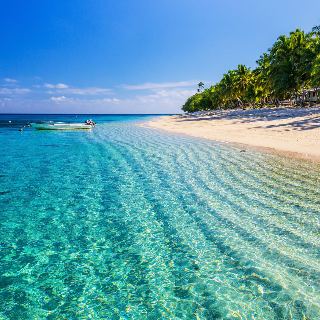 Turquoise water and white-sand beach in Fiji's Mamanuca Islands