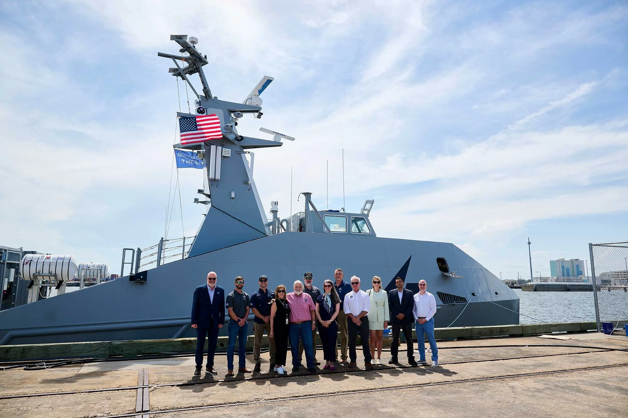 Saronic-Team-Stands-in-Front-of-Vessel-8-9-26_courtesy-Saronic-Technologies.jpg