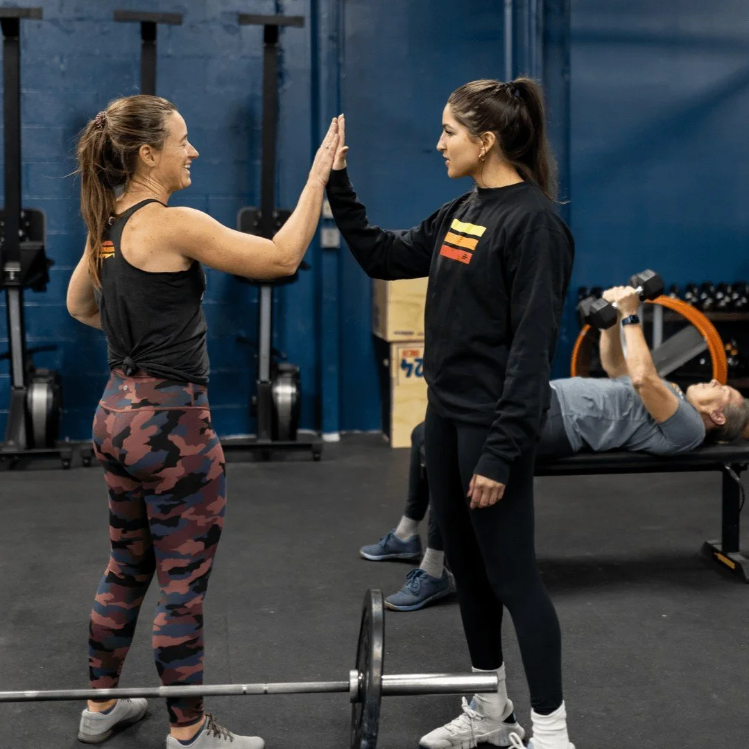 When showing up feels hard, the people around you matter. 

Coaches who pay attention. 
The high fives. The shared suffering. 
The quiet accountability of knowing someone expects to see you. 
A space that makes showing up feel normal, not heroic.

St