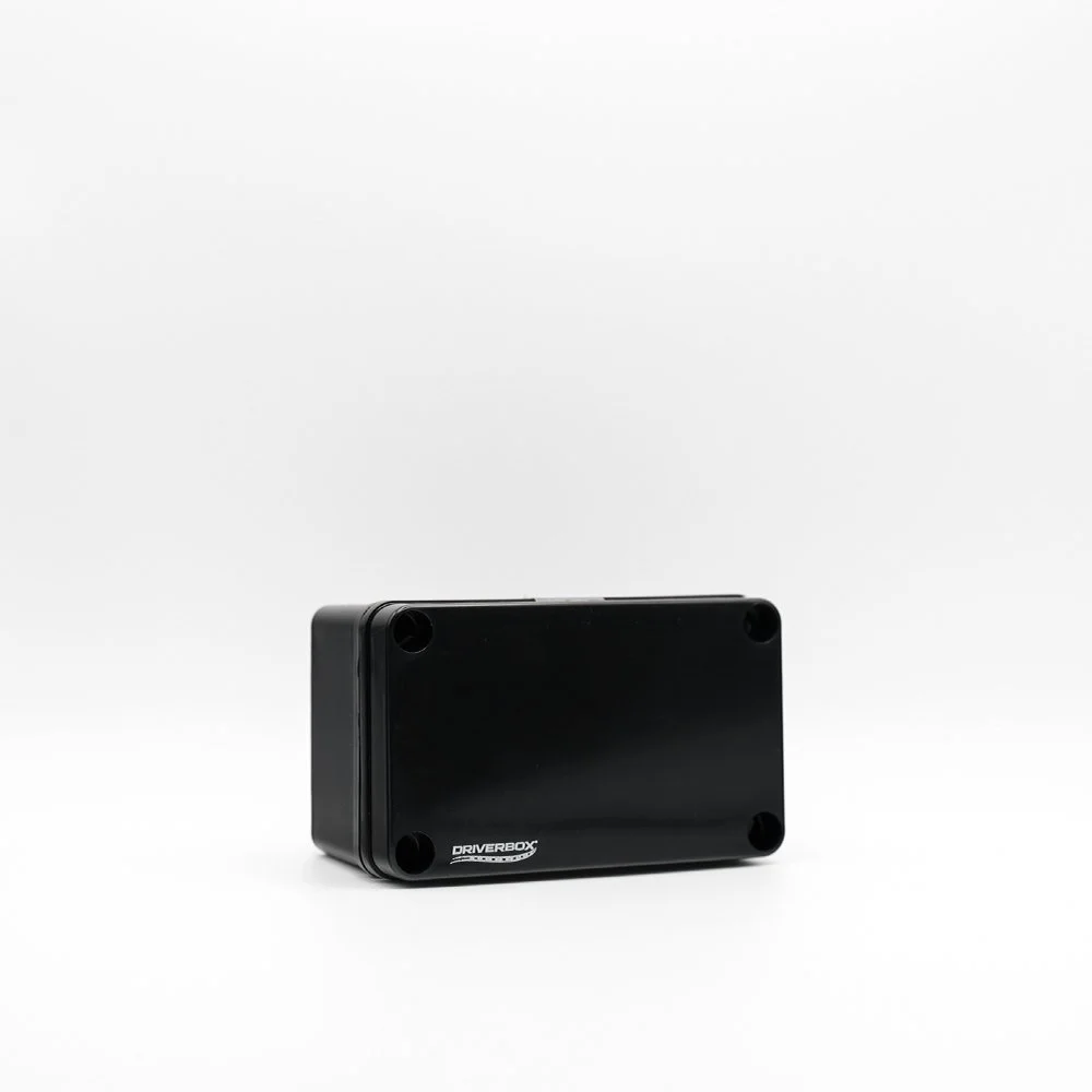 A bundle of black electrical wires secured with a Velcro strap, with one wire featuring a clear plastic connector.