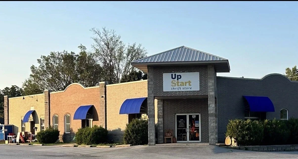Exterior of the expanded UpStart Thrift store at 235 E. Main St. in Farmington, Arkansas, with updated UpStart signage
