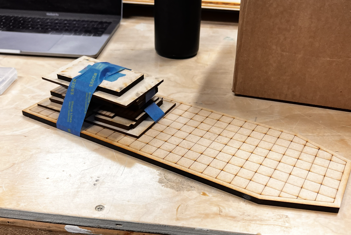 I made files for the cabin and deck in Sketchup/Illustrator and had them laser cut from MDF.