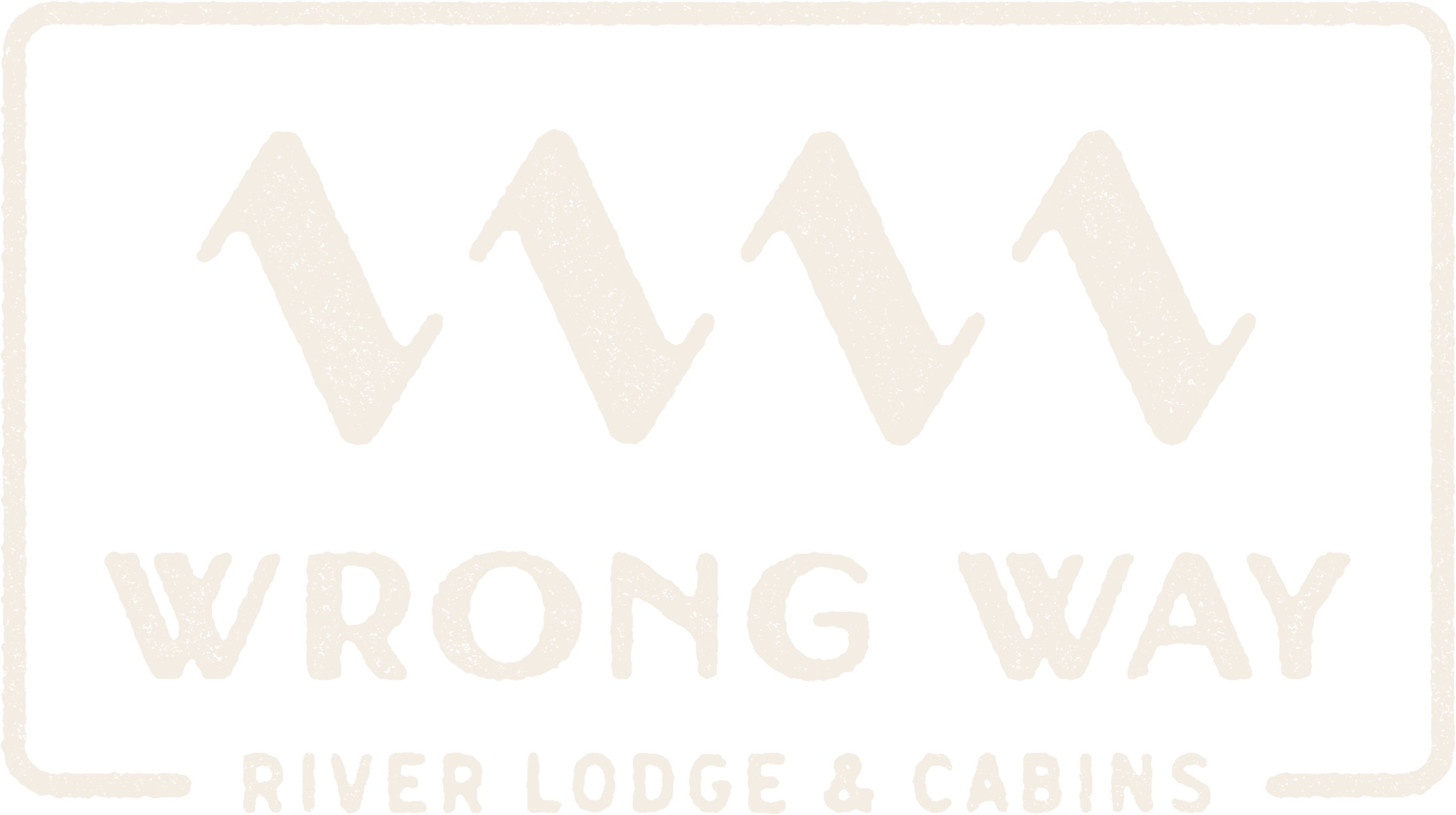 Sign with chevron arrows pointing up and down, text reads 'Wrong Way,' and 'River Lodge & Cabins' at the bottom.