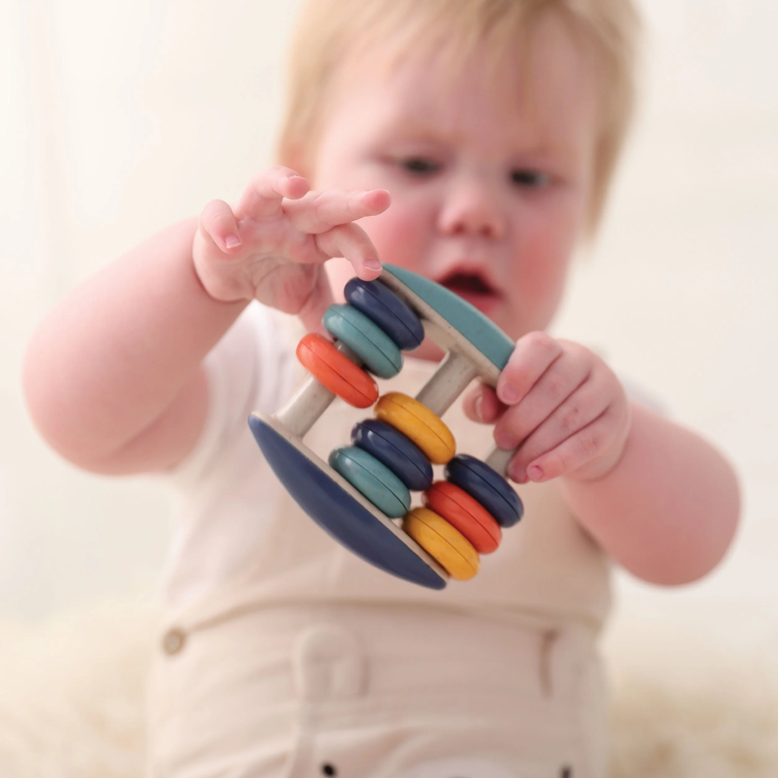 76001 Abacus Rattle_Lifestyle_1.jpg