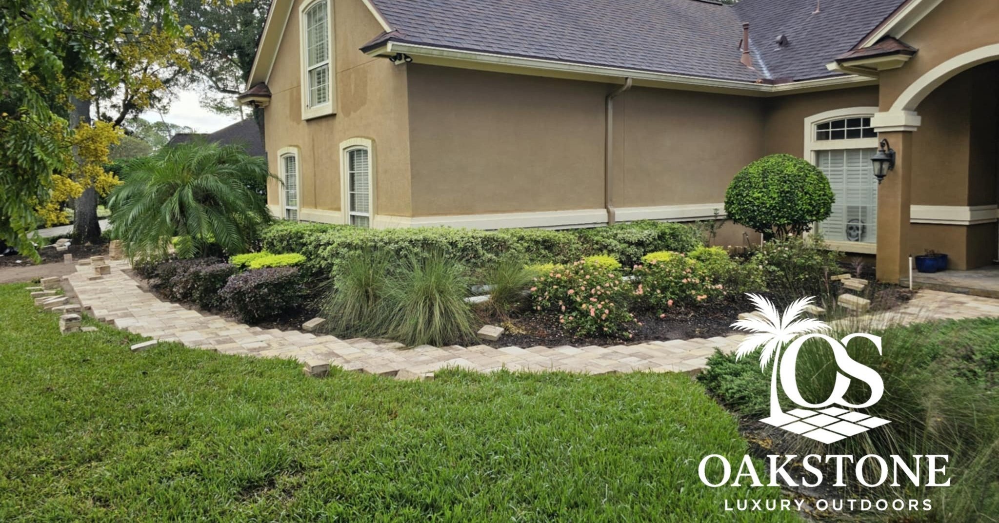 Part 2: The tropical paradise makeover continues! 🌴🌞

To complement the stunning new driveway and walkway, we crafted a lush landscape filled with:

🌿 Birds of Paradise for drama &amp; height
🌿 Bold-textured Alocasia Caladoras (elephant ears)
🌿 