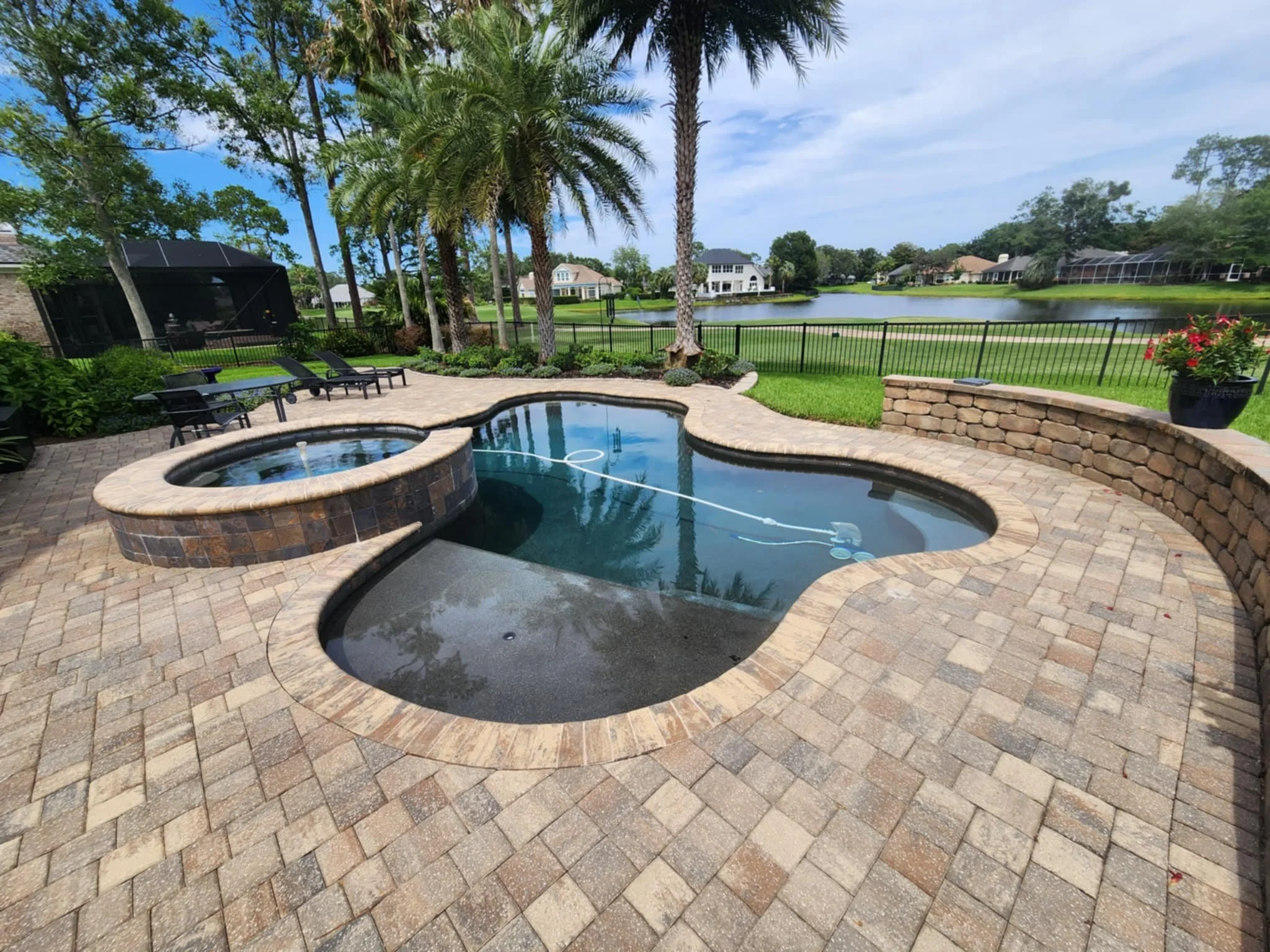 Jacksonville Paver Contractor Custom Paver Pool Deck with bullnose coping in Jacksonville Florida by OakStone Luxury Outdoors