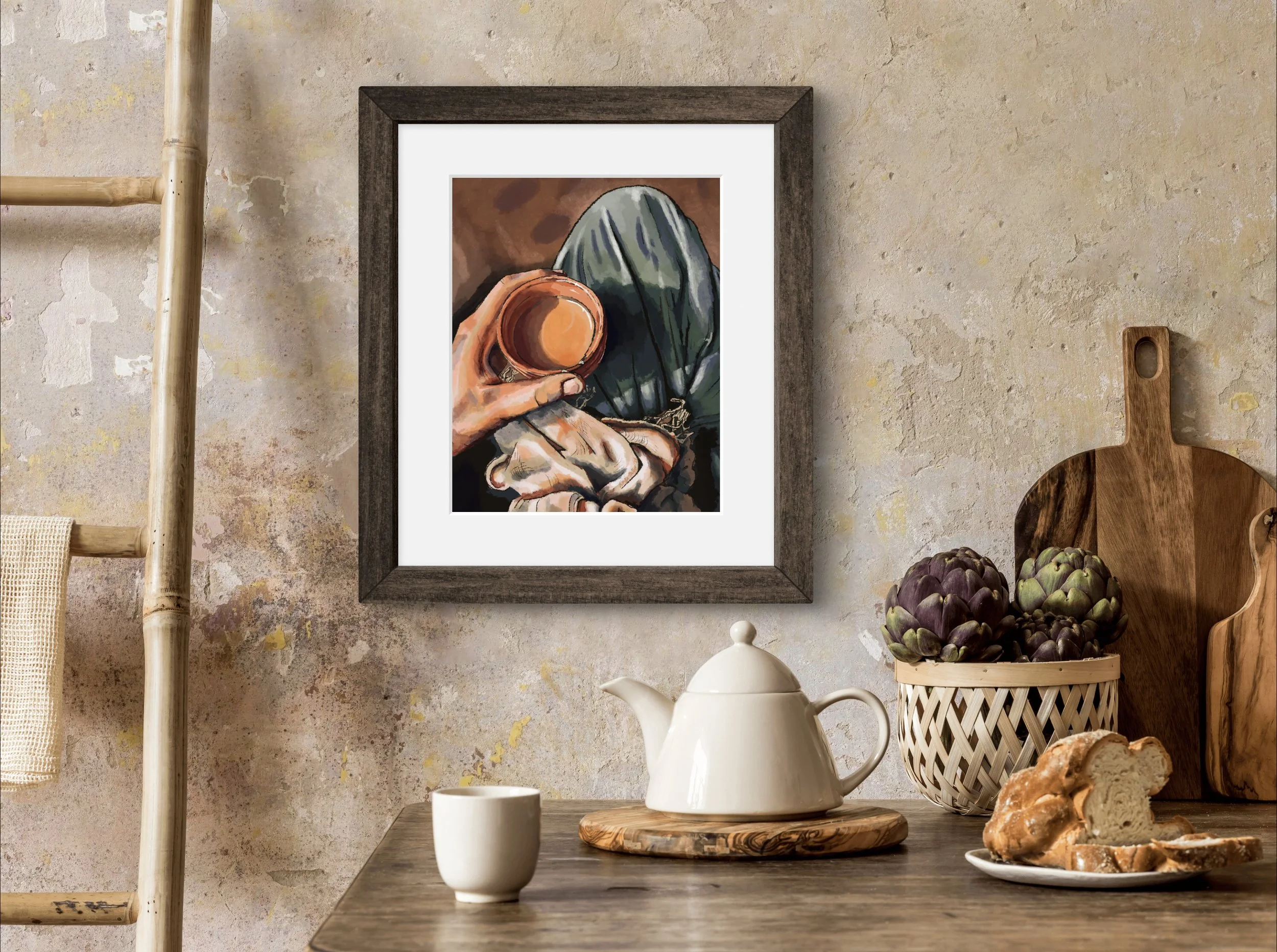 A kitchen or dining area with a wooden table, featuring a white teapot on a wooden tray, a small white cup, a basket of artichokes, and a sliced loaf of bread. In the background, there's a framed artwork on a textured wall and wooden kitchen tools, including an artichoke-shaped cutting board.