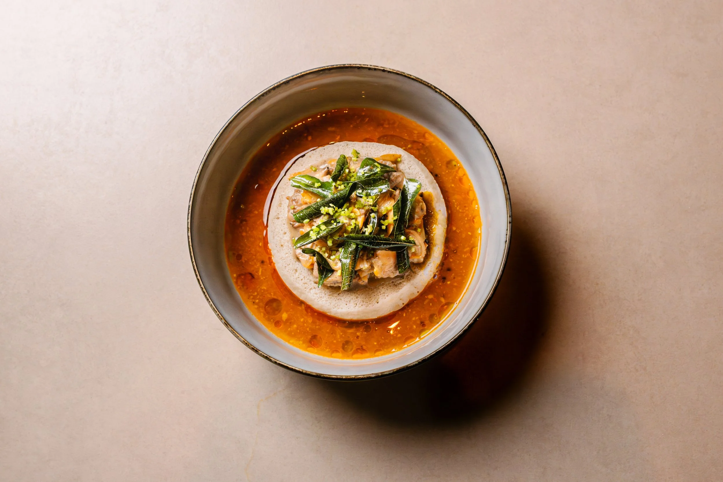 black pepper clam and idli at kavita, vancouver
