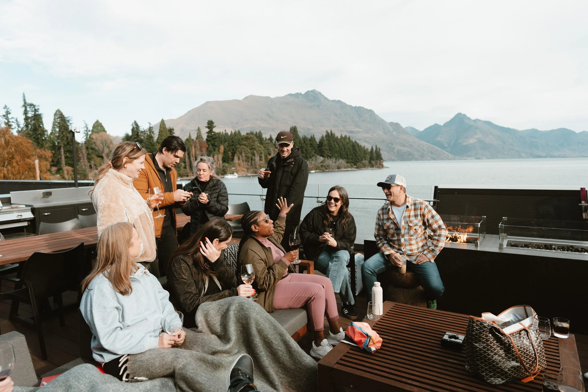 Group of North American event professionals having lunch at penthouse during incentive program in Queenstown New Zealand