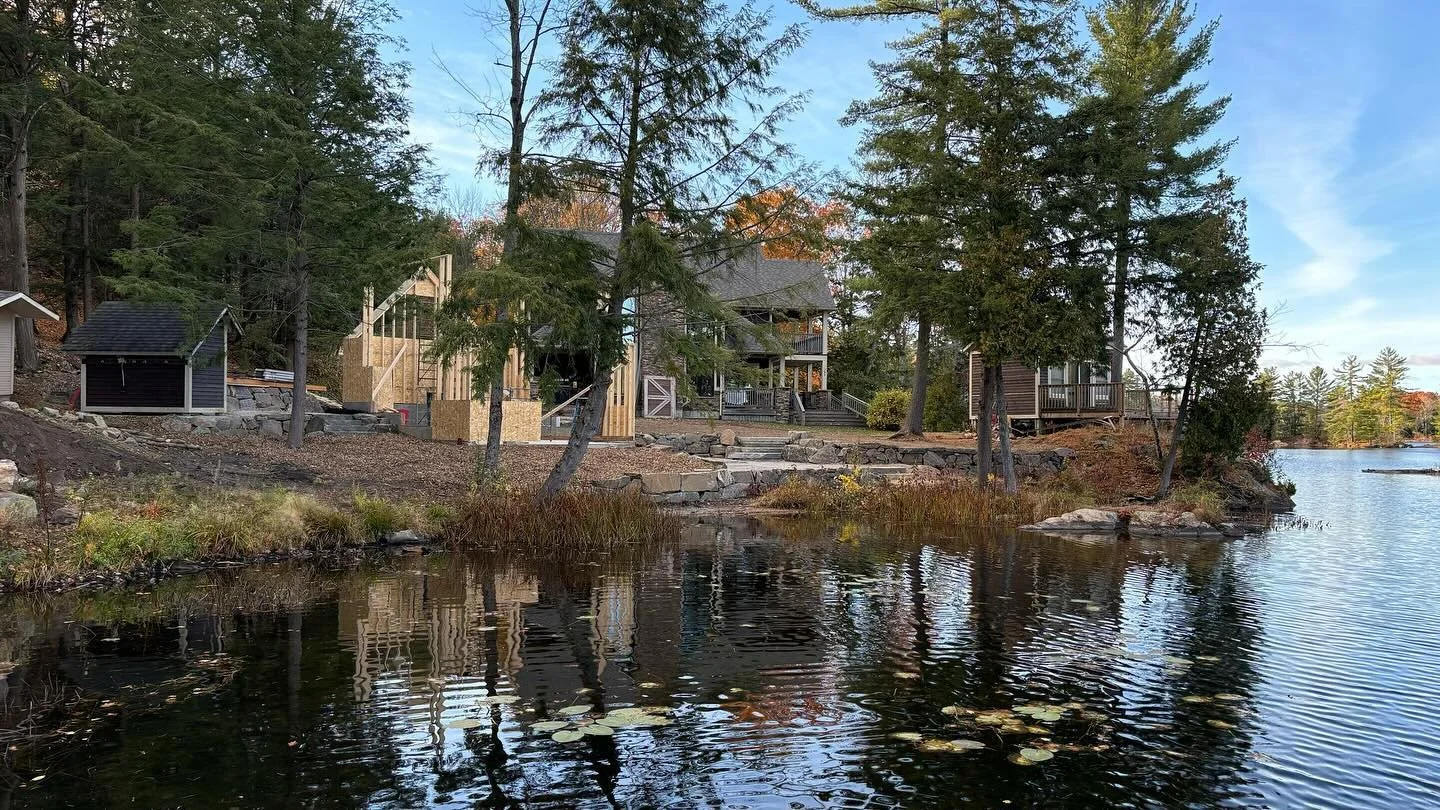Blast rock retaining walls around a new boat house.