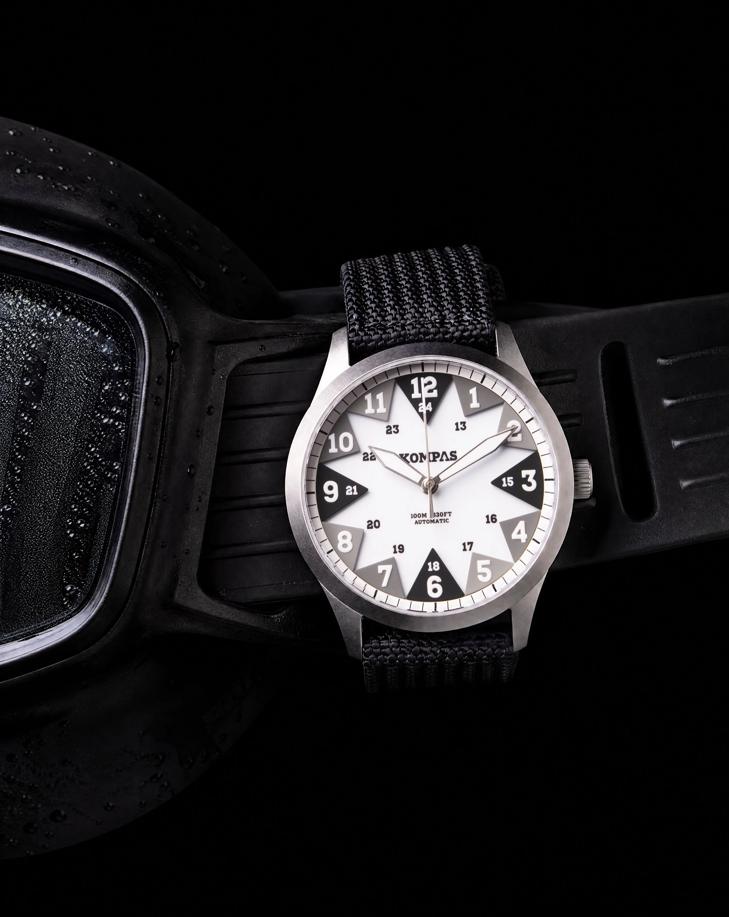 Built for getting lost underwater.
Paired with the tools made to explore deeper.

With 100 m water resistance, the North was engineered for clarity under pressure through our triangular performance layer, high visibility markers, and rugged sandblast