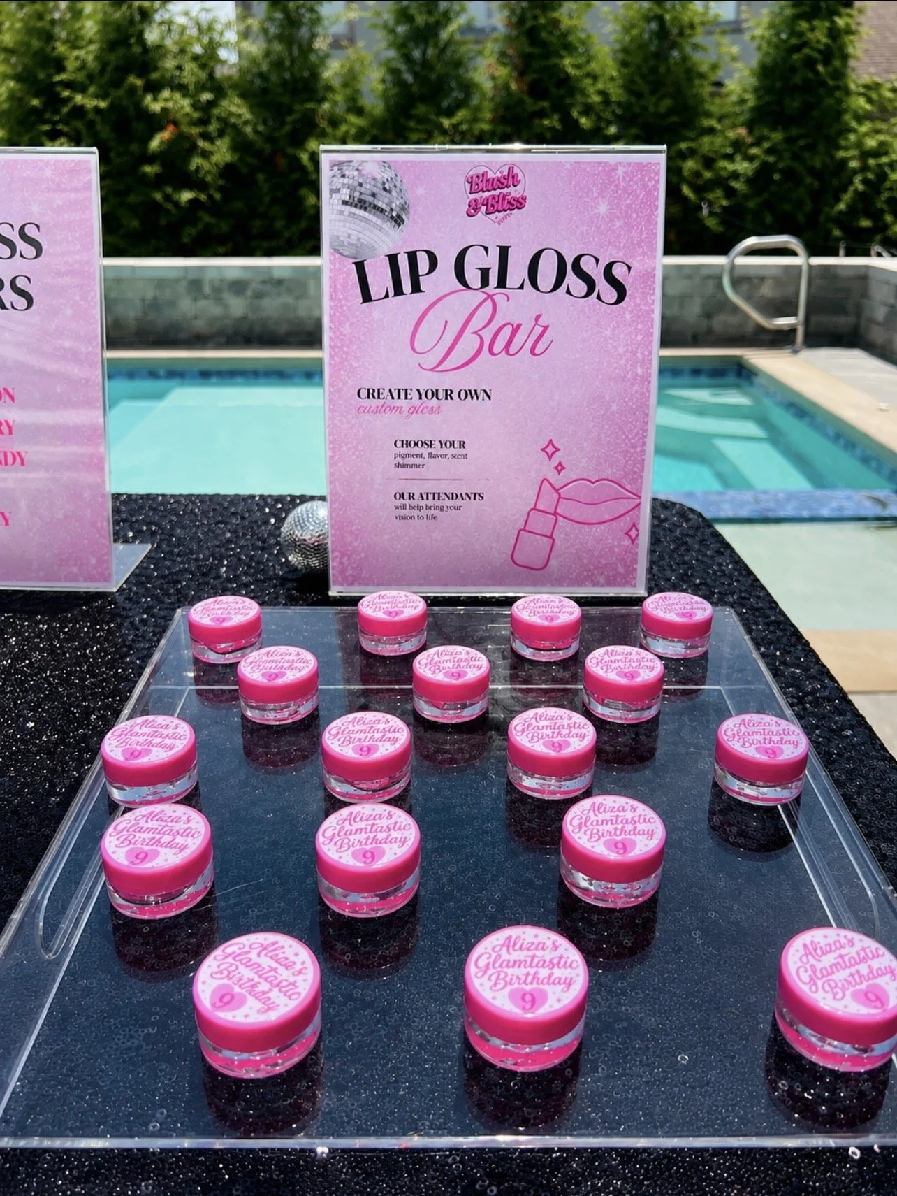 Lip Gloss Making Station by Blush & Bliss by Mya for Bat Mitzvahs, Sweet 16s, and Birthday Parties in Chicago & North Shore. Guests create custom lip glosses and personalized glam accessories through an interactive makeup beauty experience.
