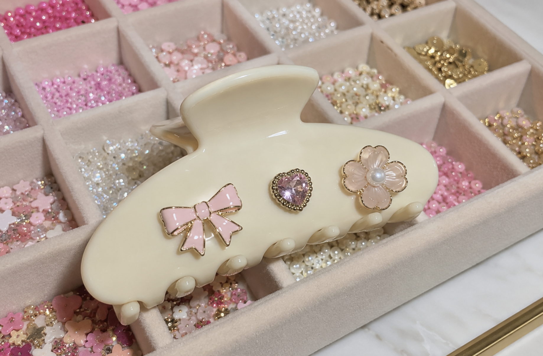 Custom hair claw clips decorated with charms and embellishments at the Blush & Bliss by Mya clip decorating station. Interactive craft entertainment for Chicago Bat Mitzvahs, birthdays, Sweet 16s, and private events.