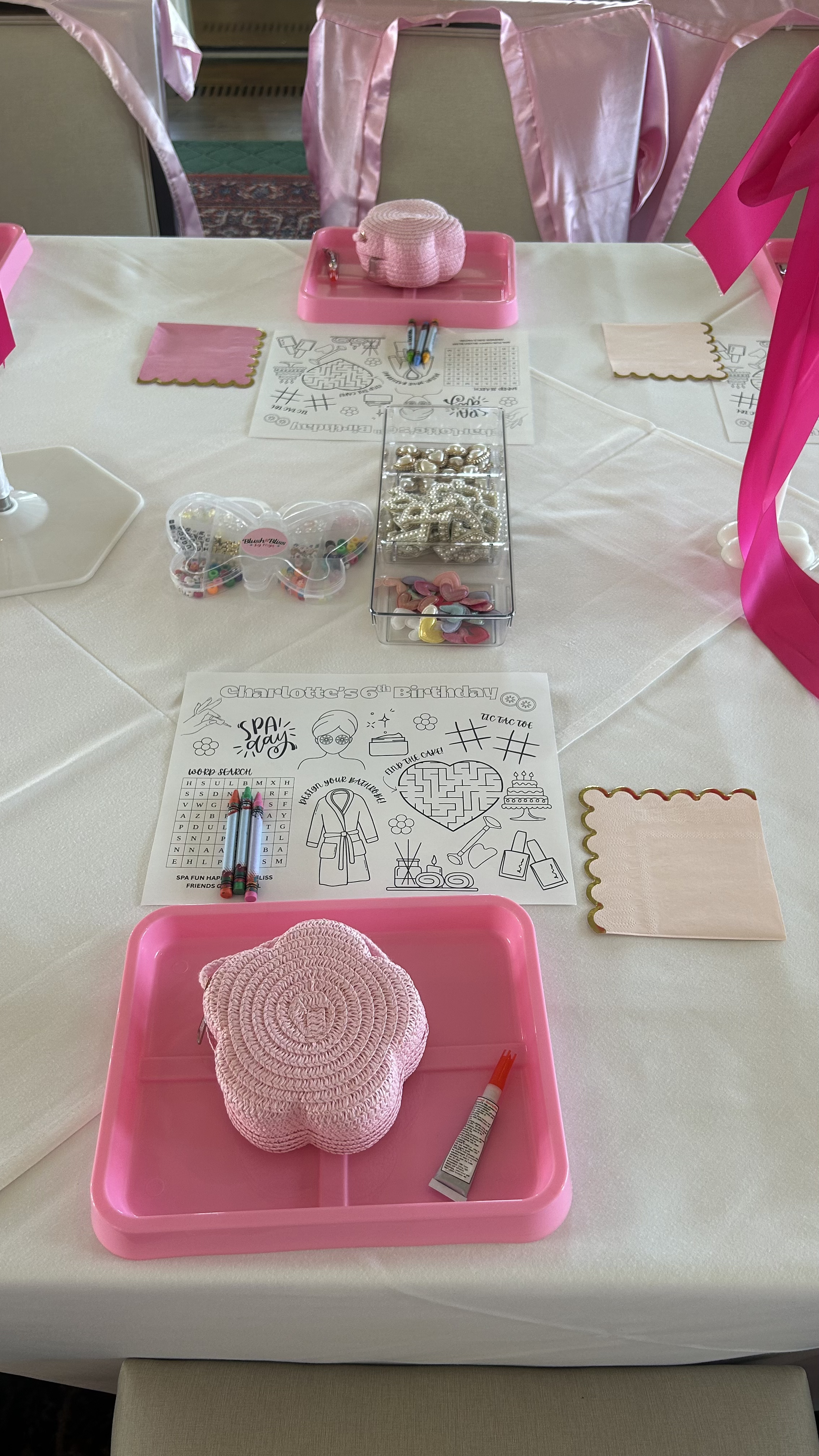 A premier bedazzle craft activity station, purse-decorating patch station, and a bead bar featuring bracelet making kits by Blush & Bliss by Mya with a glam bar and manicure bar, designed for stylish birthday parties, Mitzvahs, special events, intera