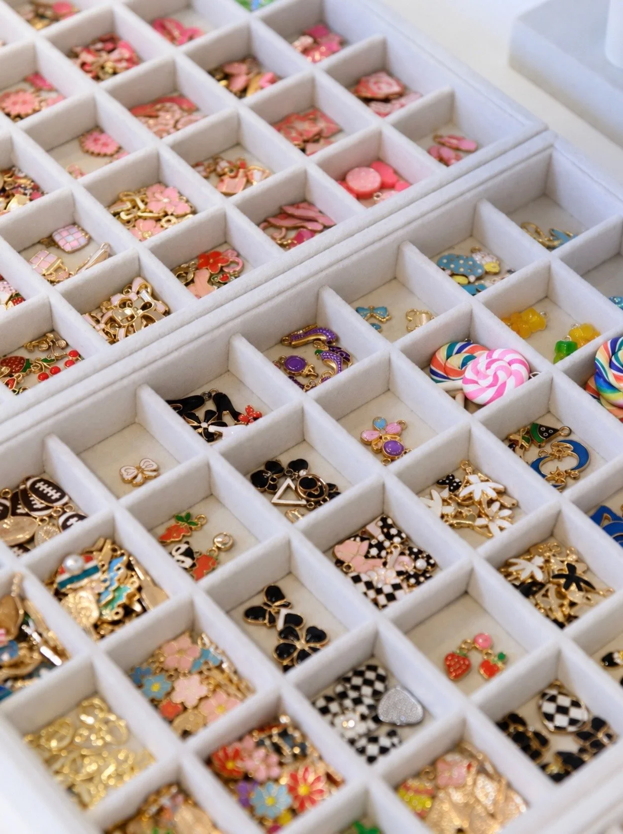 Blush & Bliss by Mya Charm Bar interactive entertainment station where guests create custom bracelets using charms and beads — the perfect Bat Mitzvah favor activity and take-home keepsake in Chicago and North Shore suburbs.