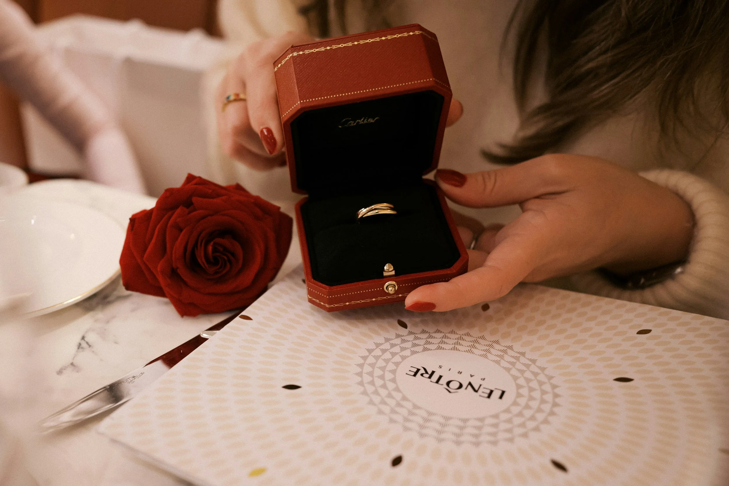 Jewelry in a gift box, highlighting high-value holiday gifts that may require scheduled personal property insurance for full coverage.