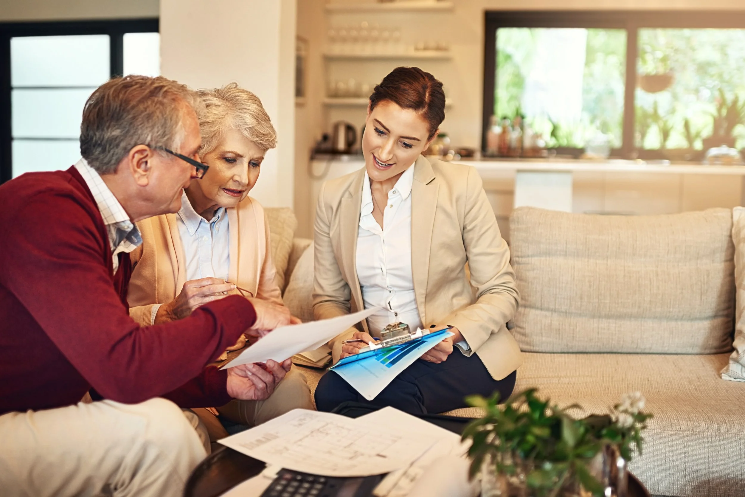 An insurance agent explaining how annuities and life insurance work to a client.
