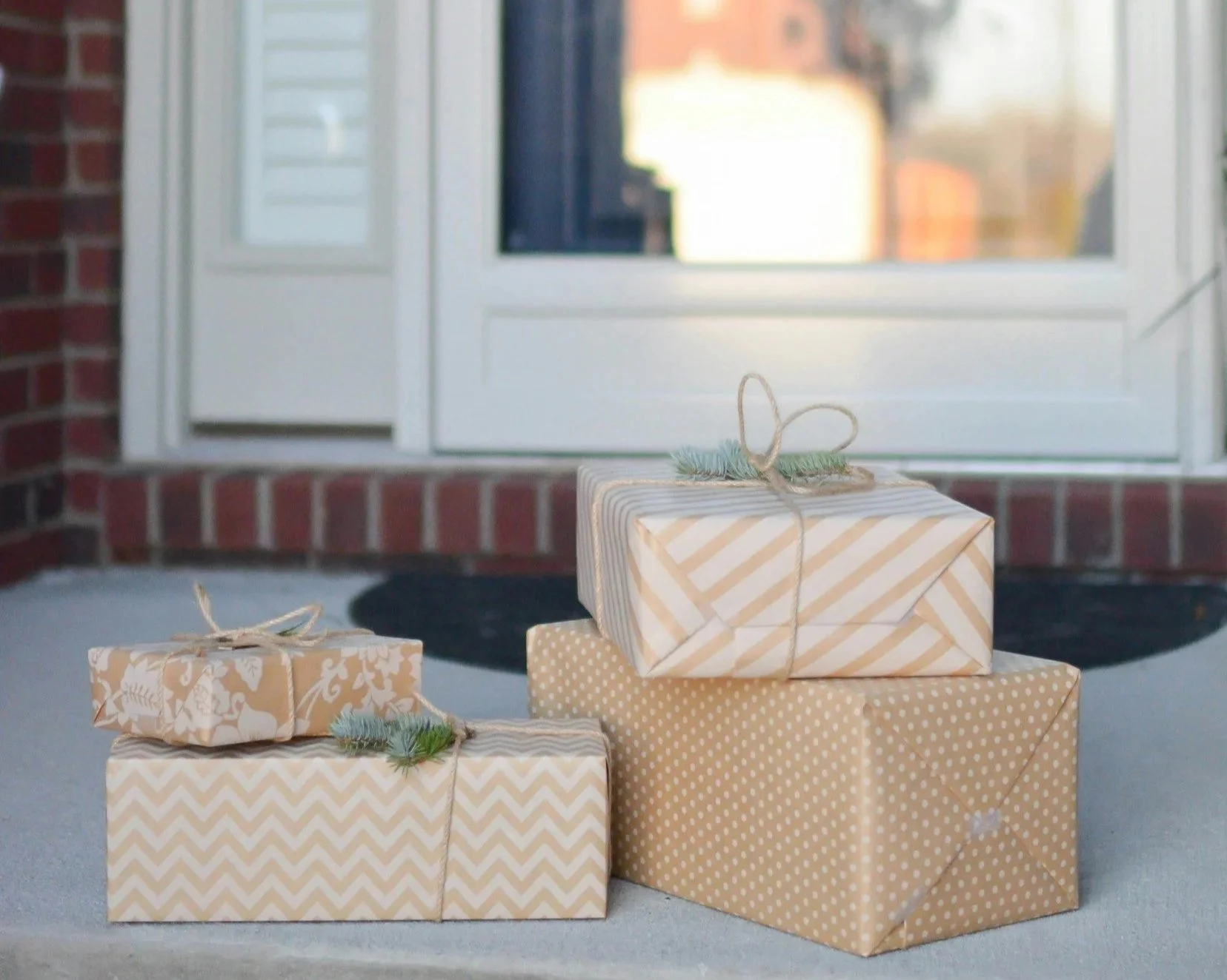Packages left on a front porch during the holidays, representing increased theft risks that renters and homeowners insurance can help protect against.