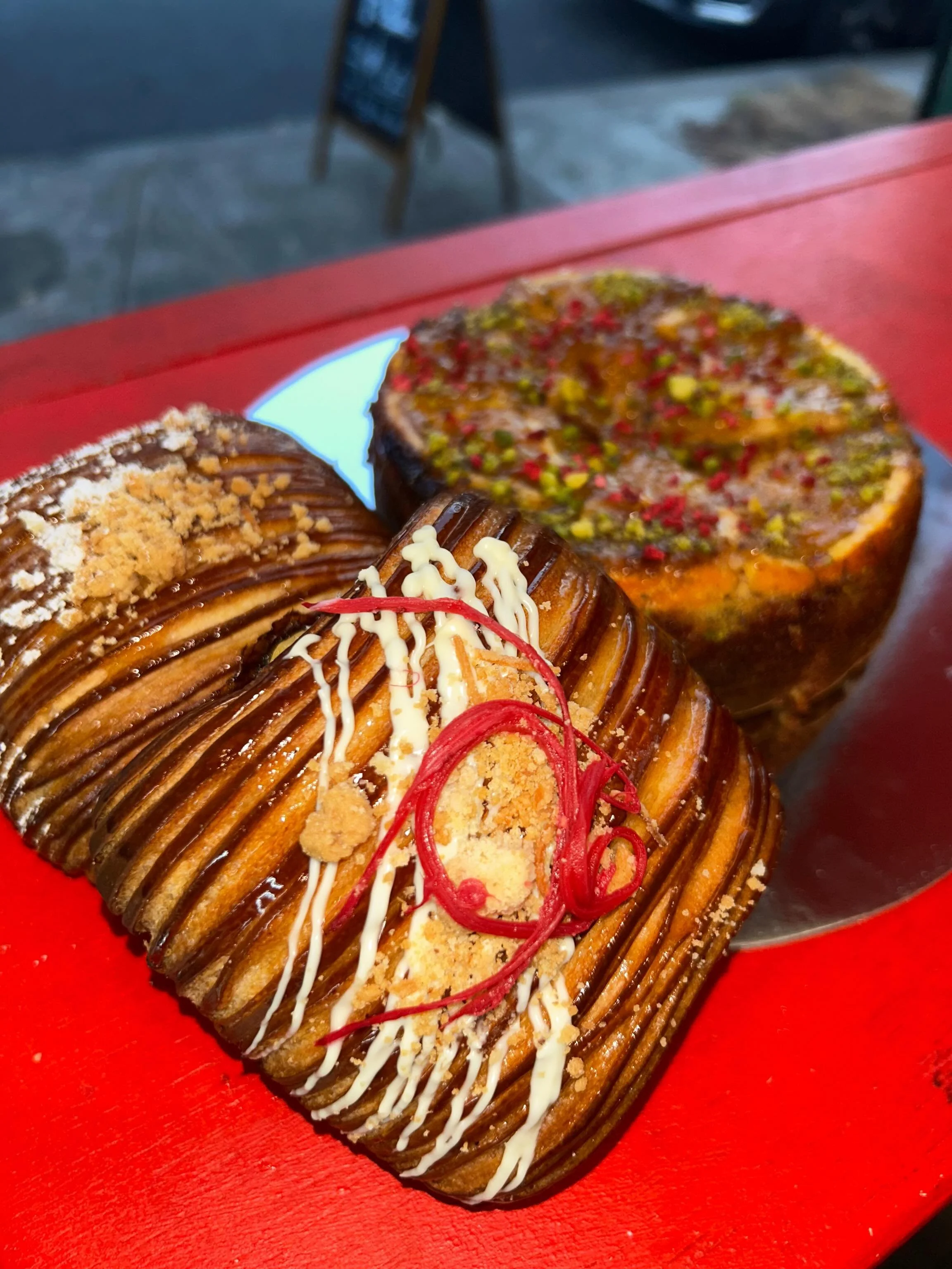 Weekend newness😍
-GF orange and almond cake
-Rhubarb crumble pain suisse
-Apple crumble pain suisse

Available all weekend until sell out 🎉