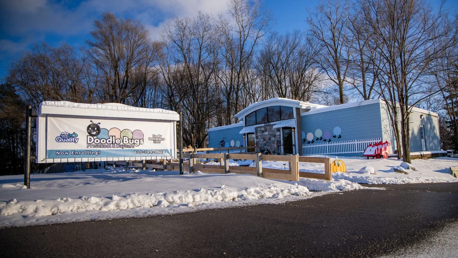 The Doodle Bugs building and sign on Davison Road in winter