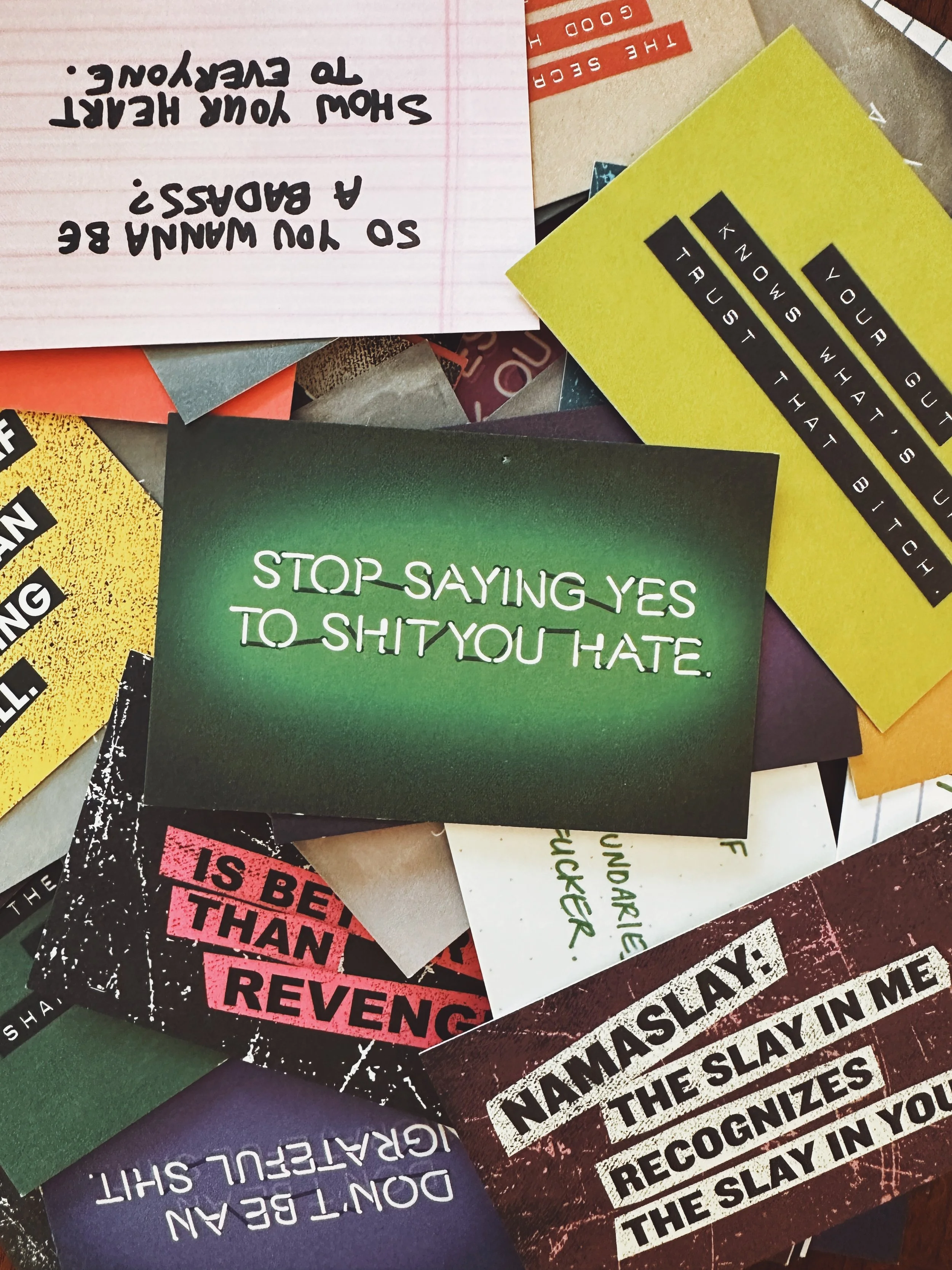 Collection of various protest and motivational cards with bold statements and messages.