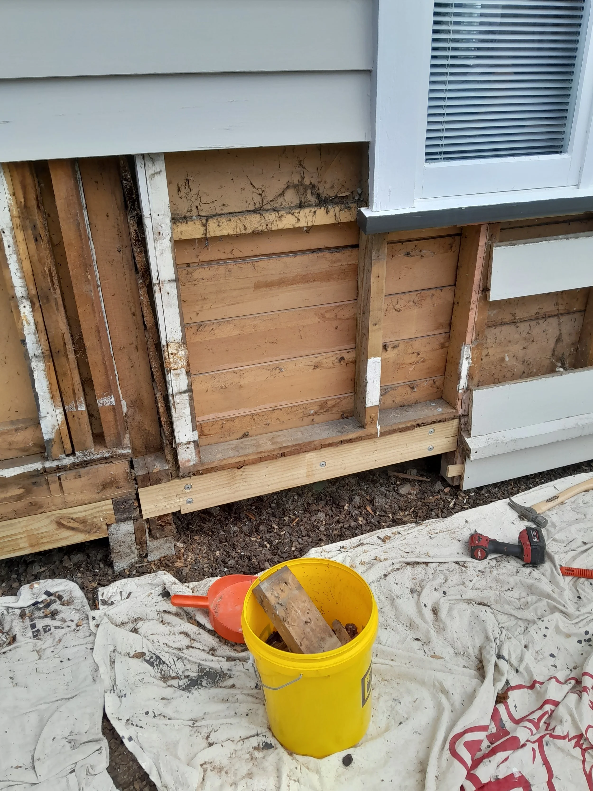 BEFORE: Weatherboard & structural repairs