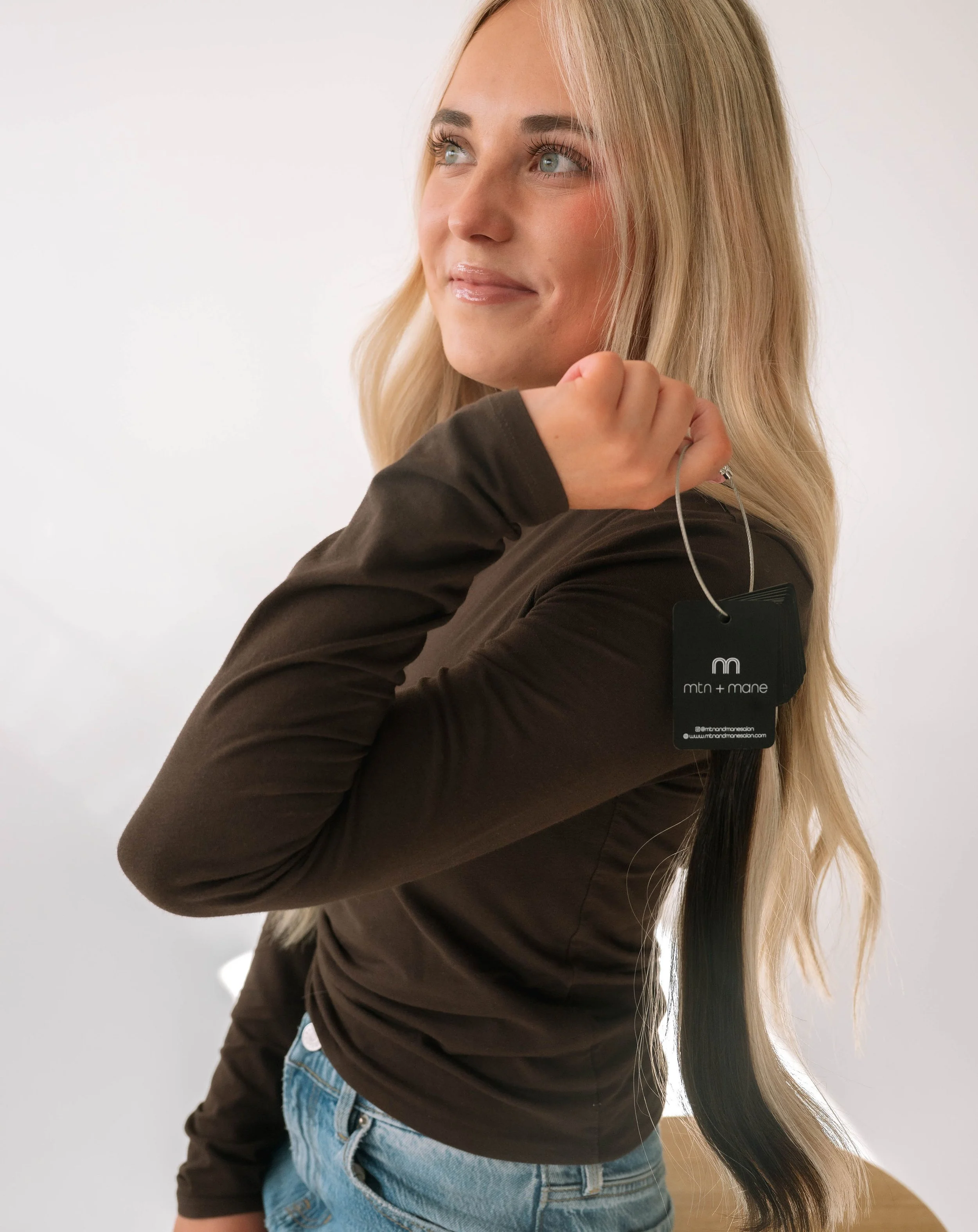 Jaida, hairstylist at Mtn + Mane Salon in Timnath, Colorado