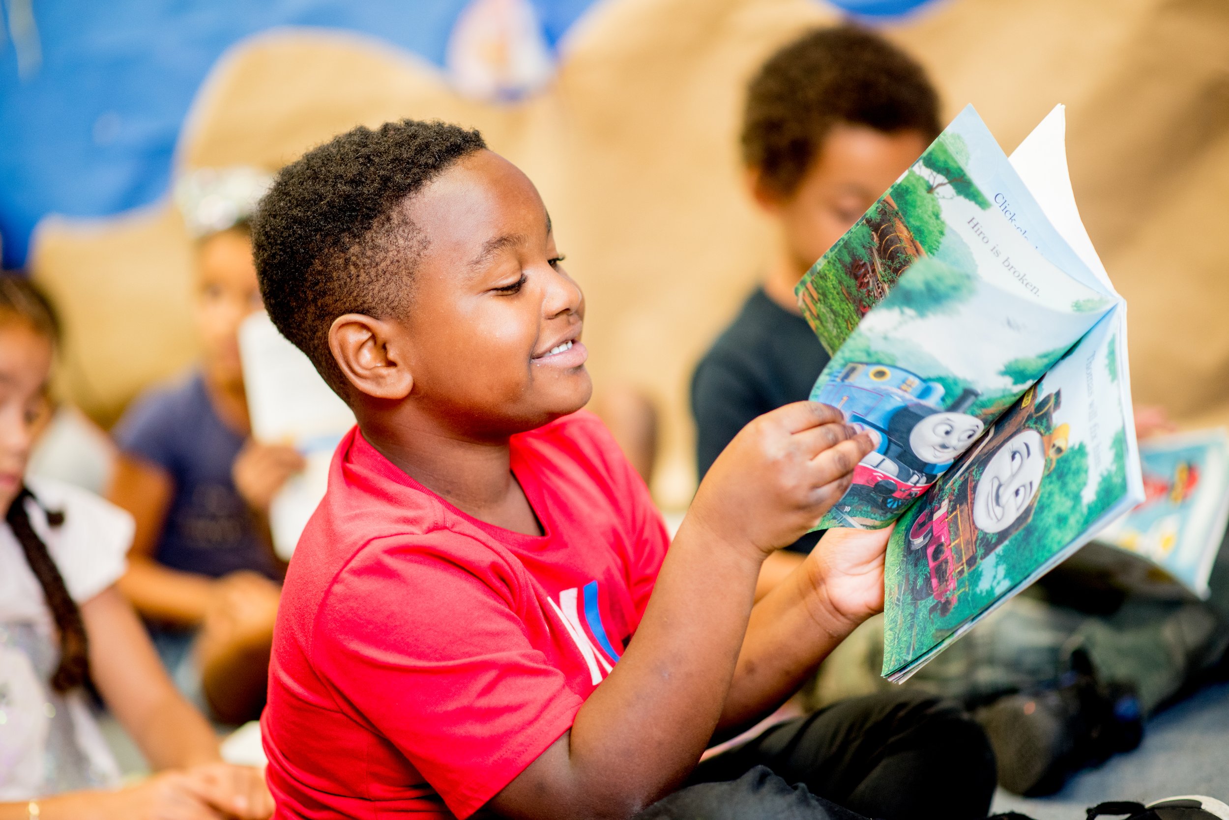 Boy reading a book