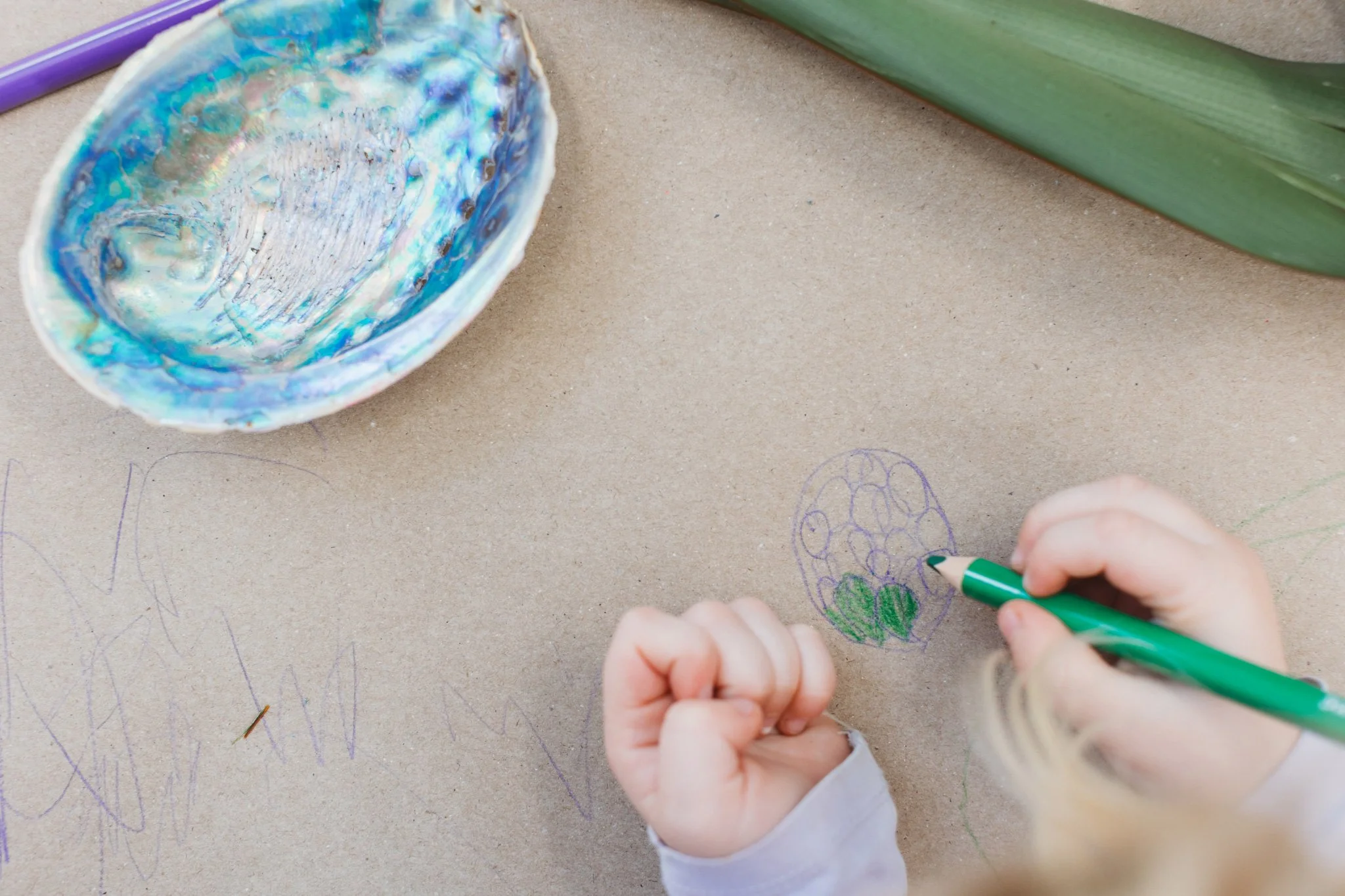 Children drawing and writing, getting ready for school at Mangere childcare