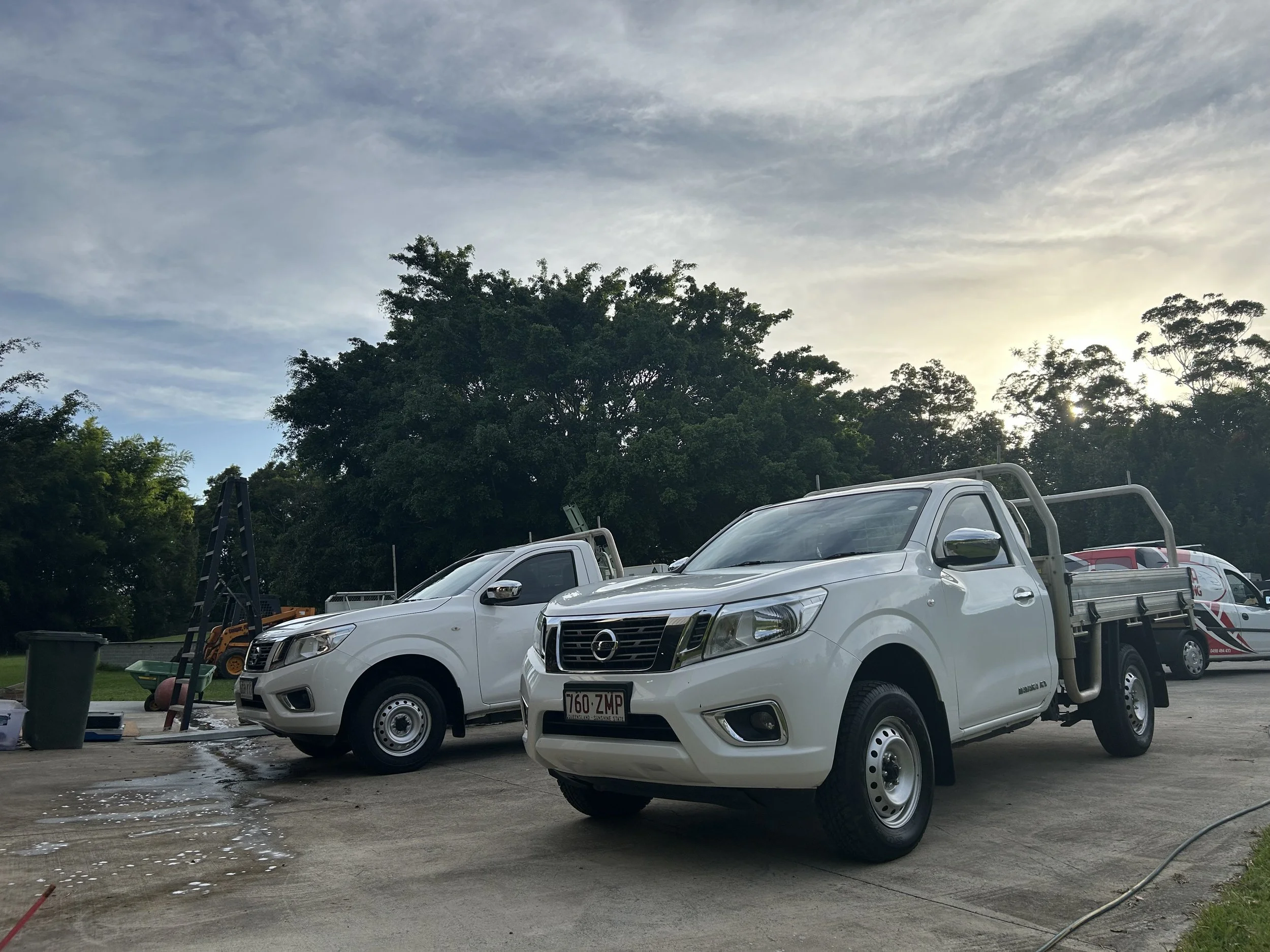 White work utes after professional mobile car detailing in Noosa