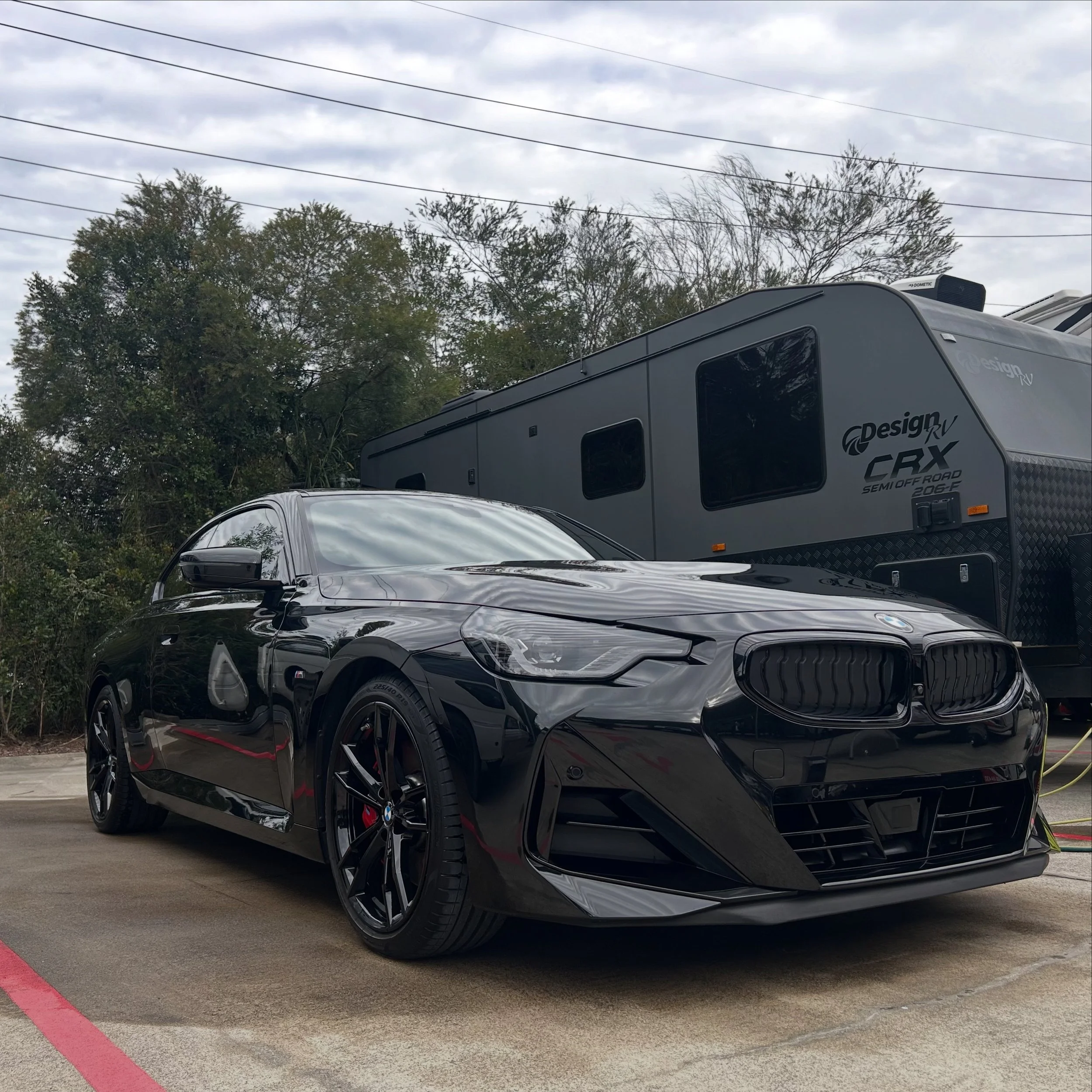 Black BMW after professional mobile car detailing in Noosa