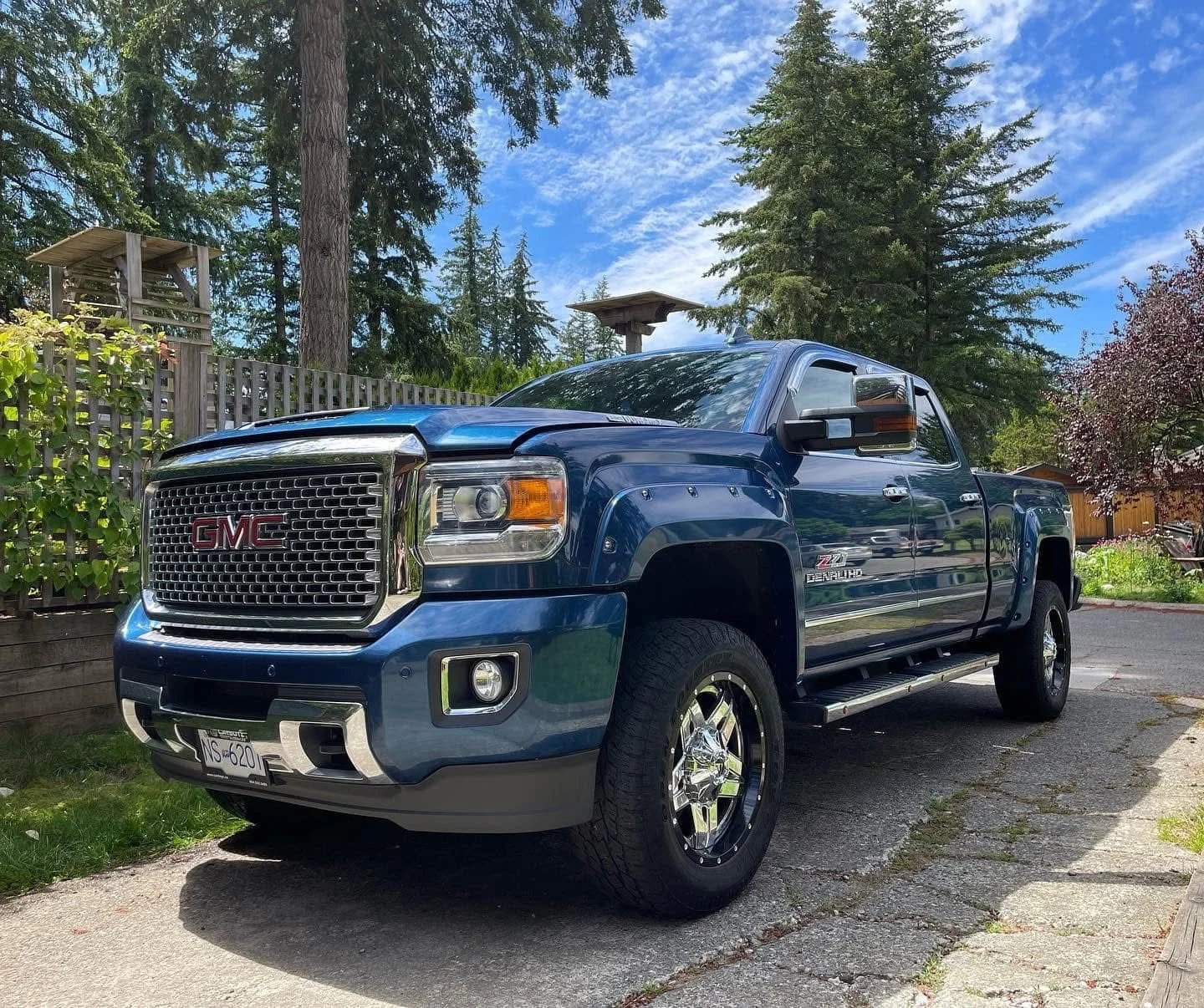 Blue GMC Sierra truck after premium exterior and interior detailing