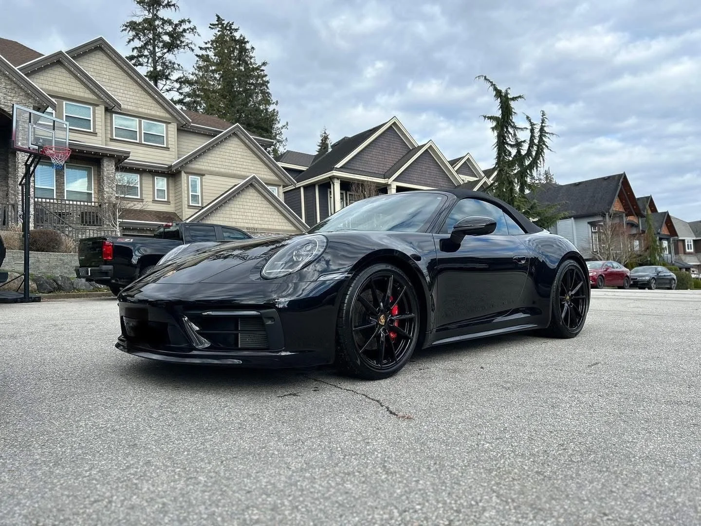 Black Corvette with mirror-finish paint correction and ceramic protection