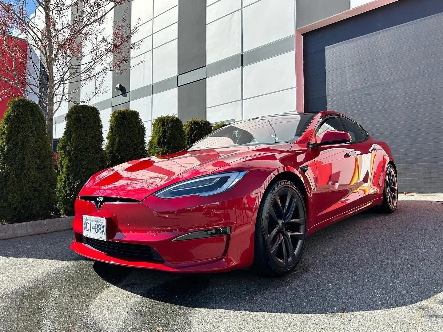 Red Tesla Model S after luxury detailing and ceramic paint protection