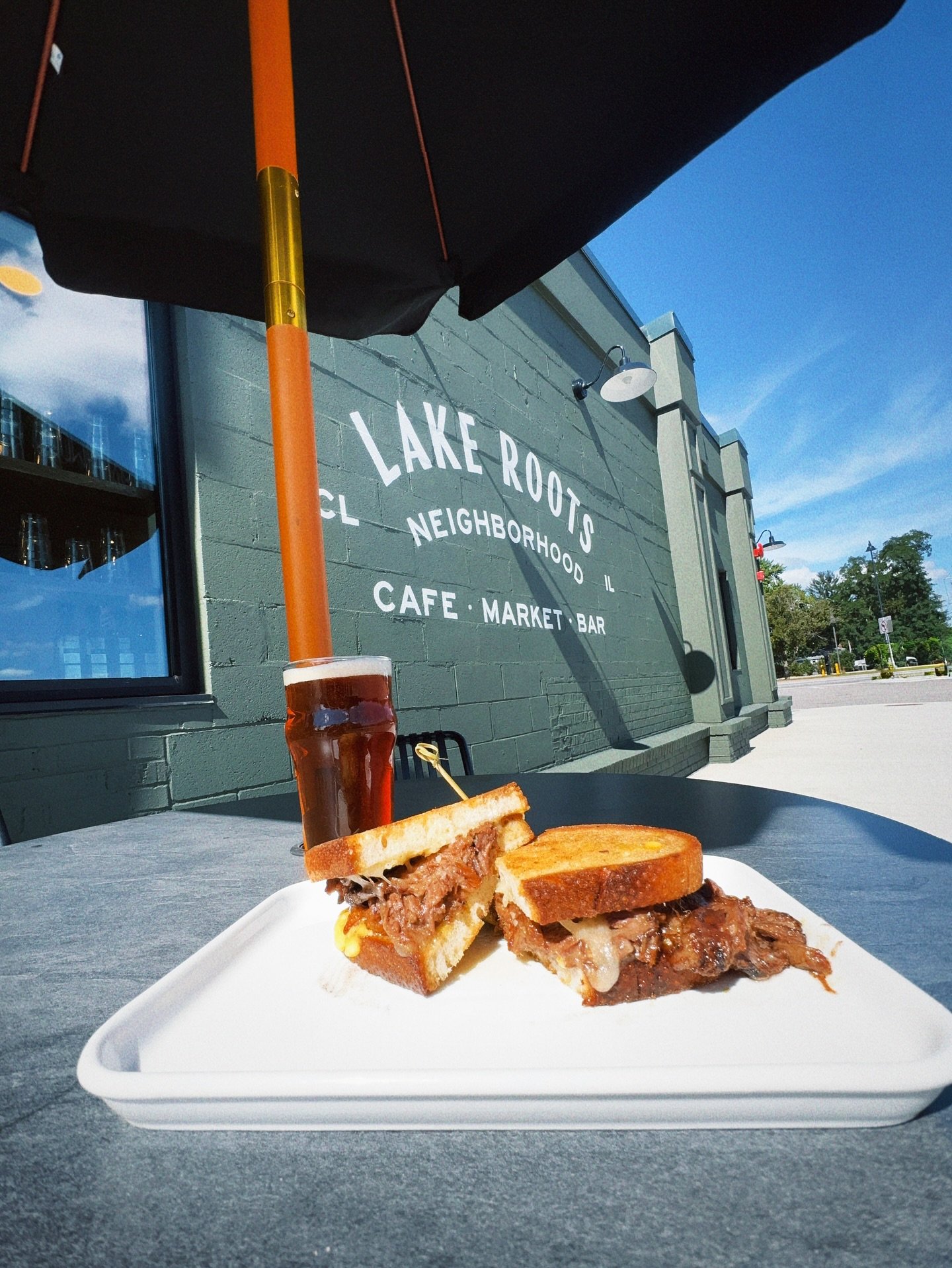 Happy Labor Day from Lake Roots! 🇺🇸

Fall specials are here, and the Braised Brisket Panini is a good place to start. Tender braised brisket, roasted garlic aioli, beer-battered onion rings + Point Reyes TomaTruffle cheese, pressed on toasted sourd