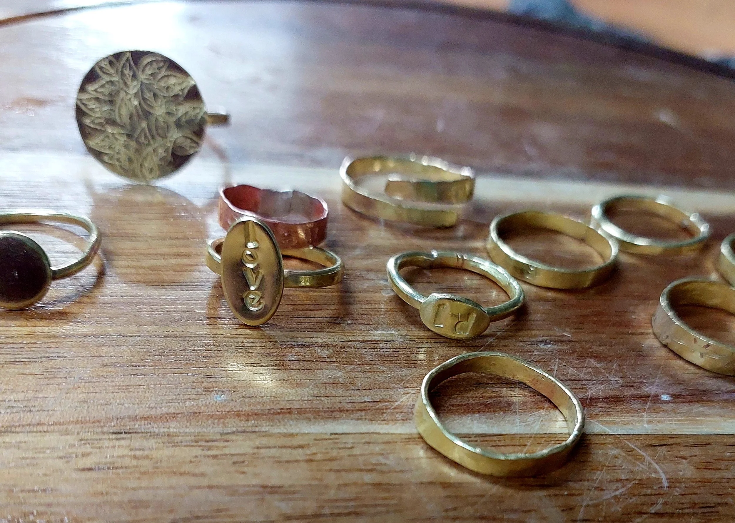 A selection of rings created by students in one of Sarah Munnings creative jewellery classes for beginners in school.