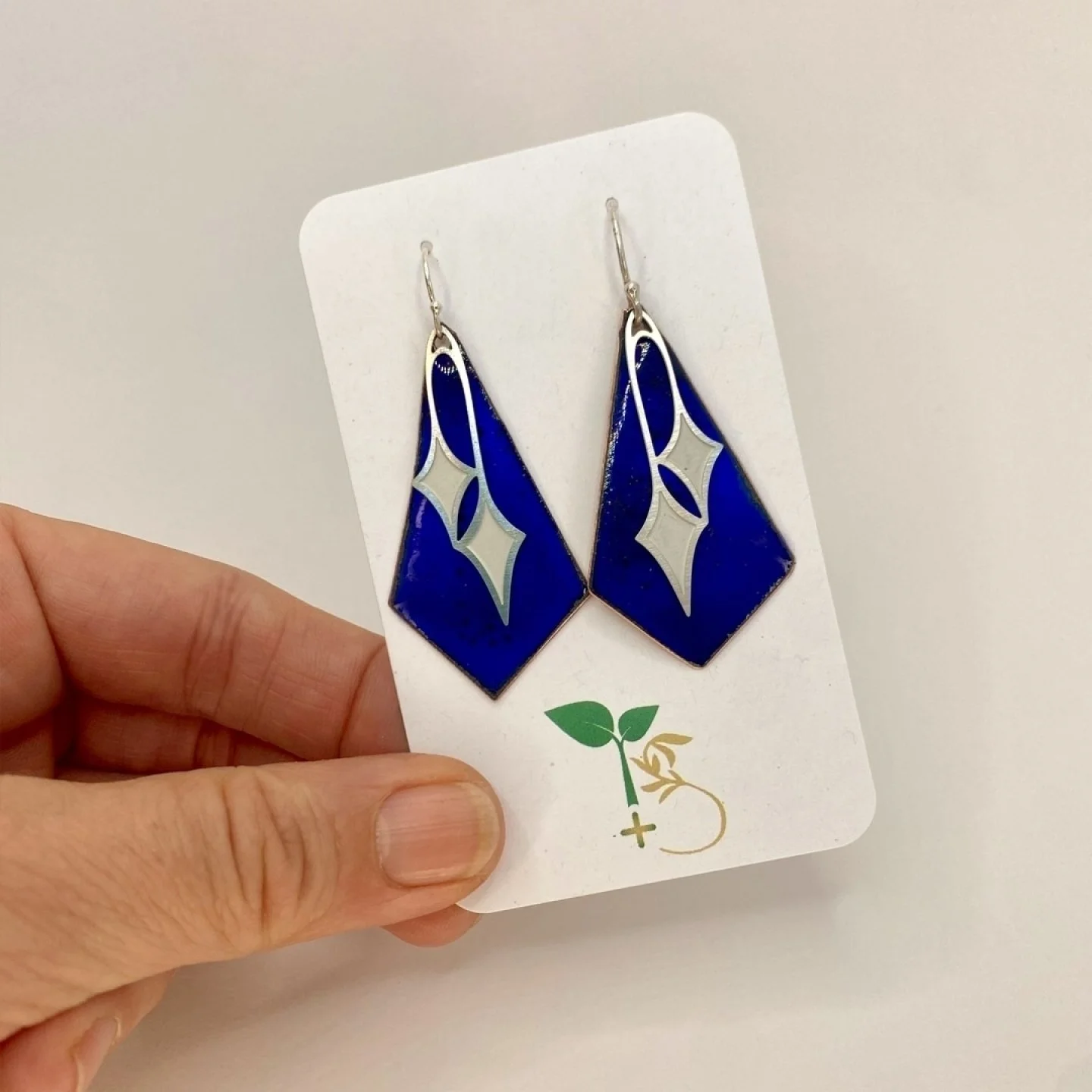 Shooting stars, falling stars, star bursts, what story do these earrings tell you? 

The cobalt blue provides such a stunning backdrop to the delicate stainless steel and I adore the two tone finish, these *might* be my favourite pair (today at least