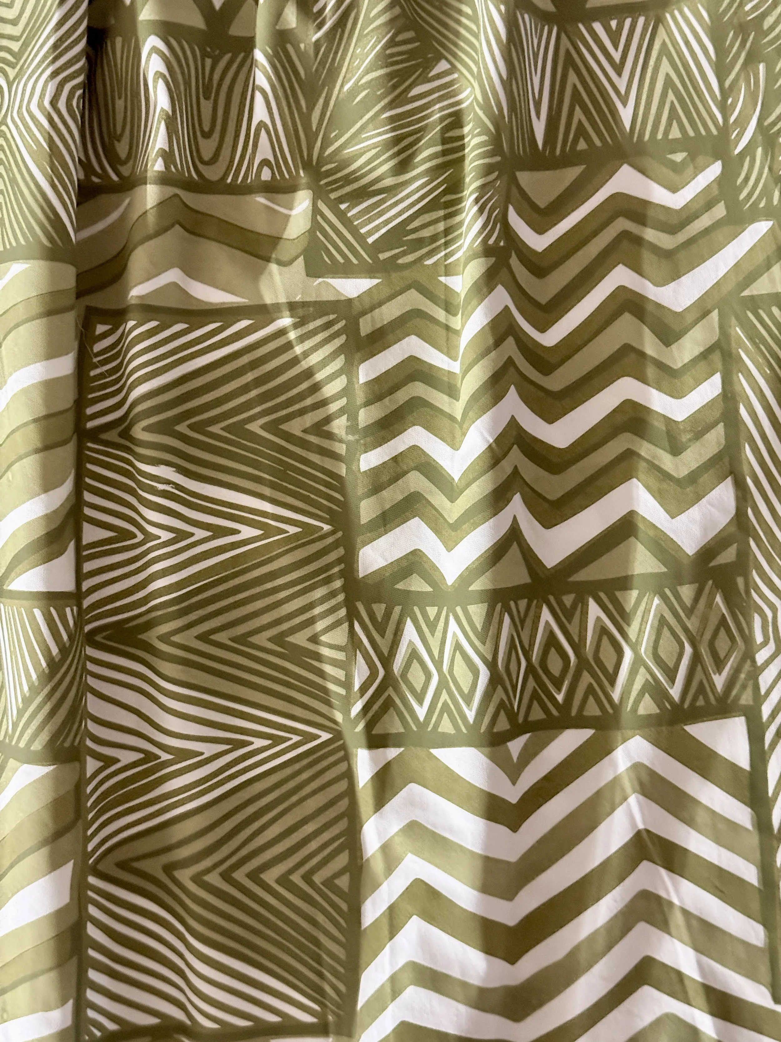 Cotton poplin skirt with green pukamani print detail .jpg
