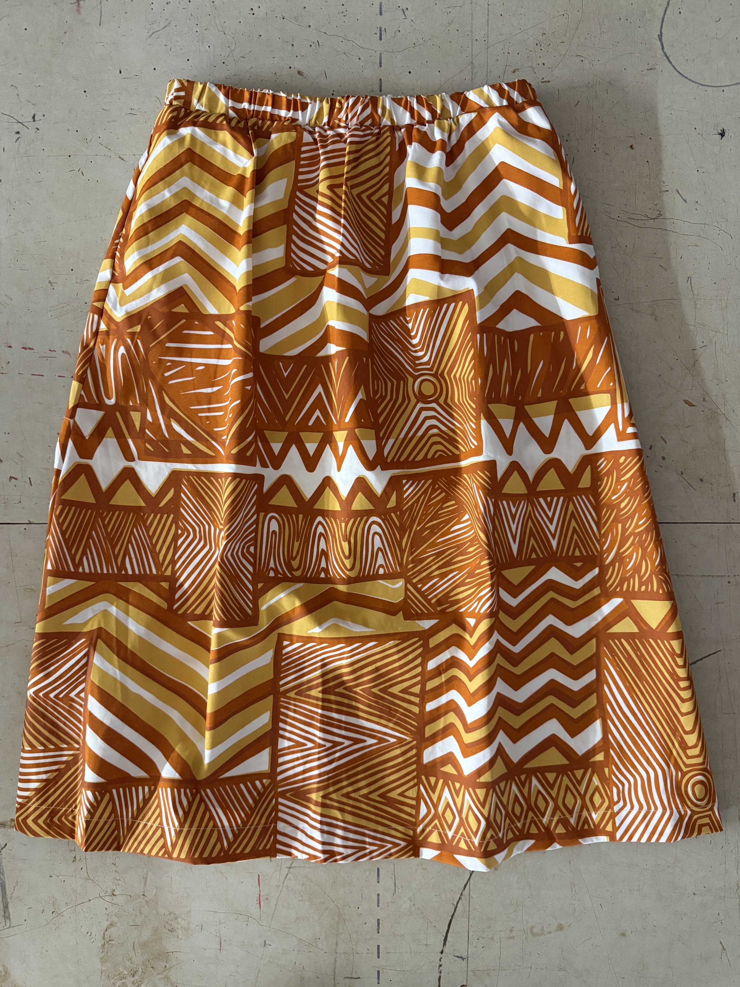 cotton skirt with rust and ochre print.jpg (Copy)