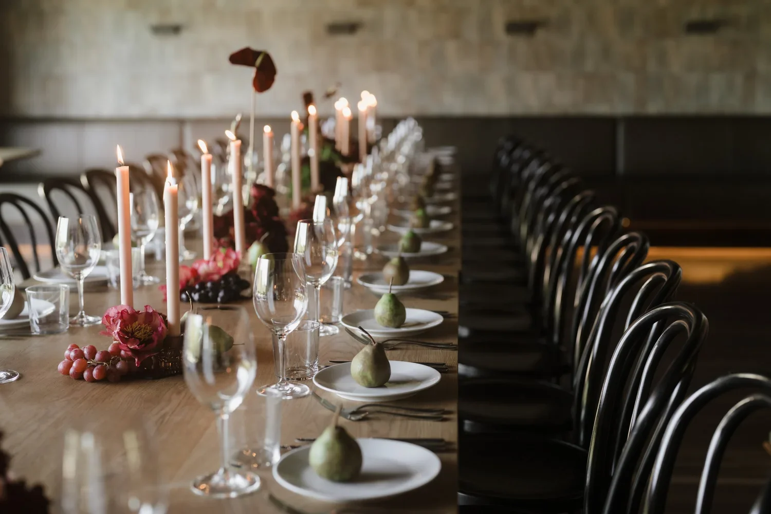 Mantons Creek Estate wedding tablescape with pears, tall candles and soft floral accents.