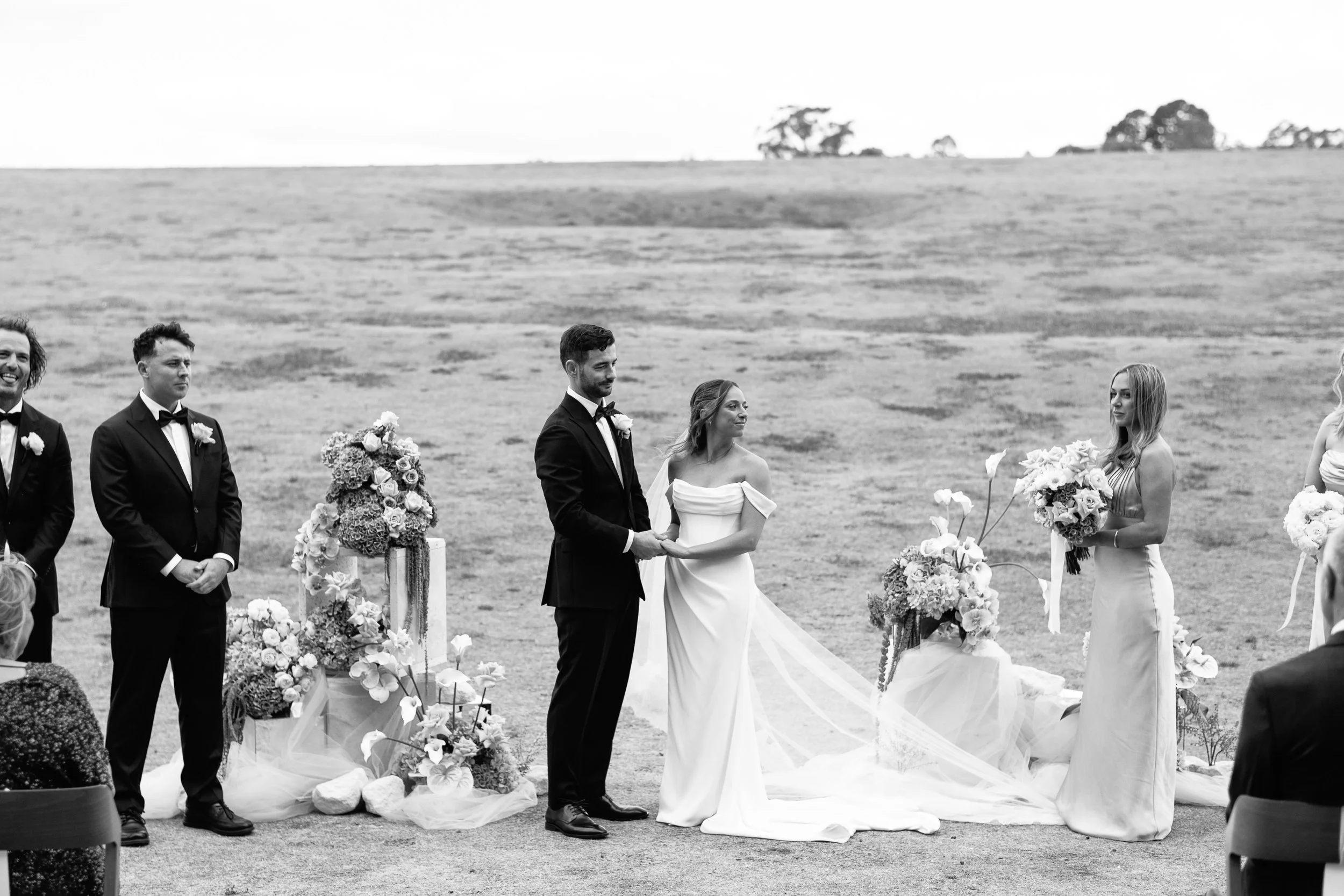 Hubert Estate Yarra Valley ceremony with the couple exchanging vows surrounded by Poppy Culture’s floral installations.