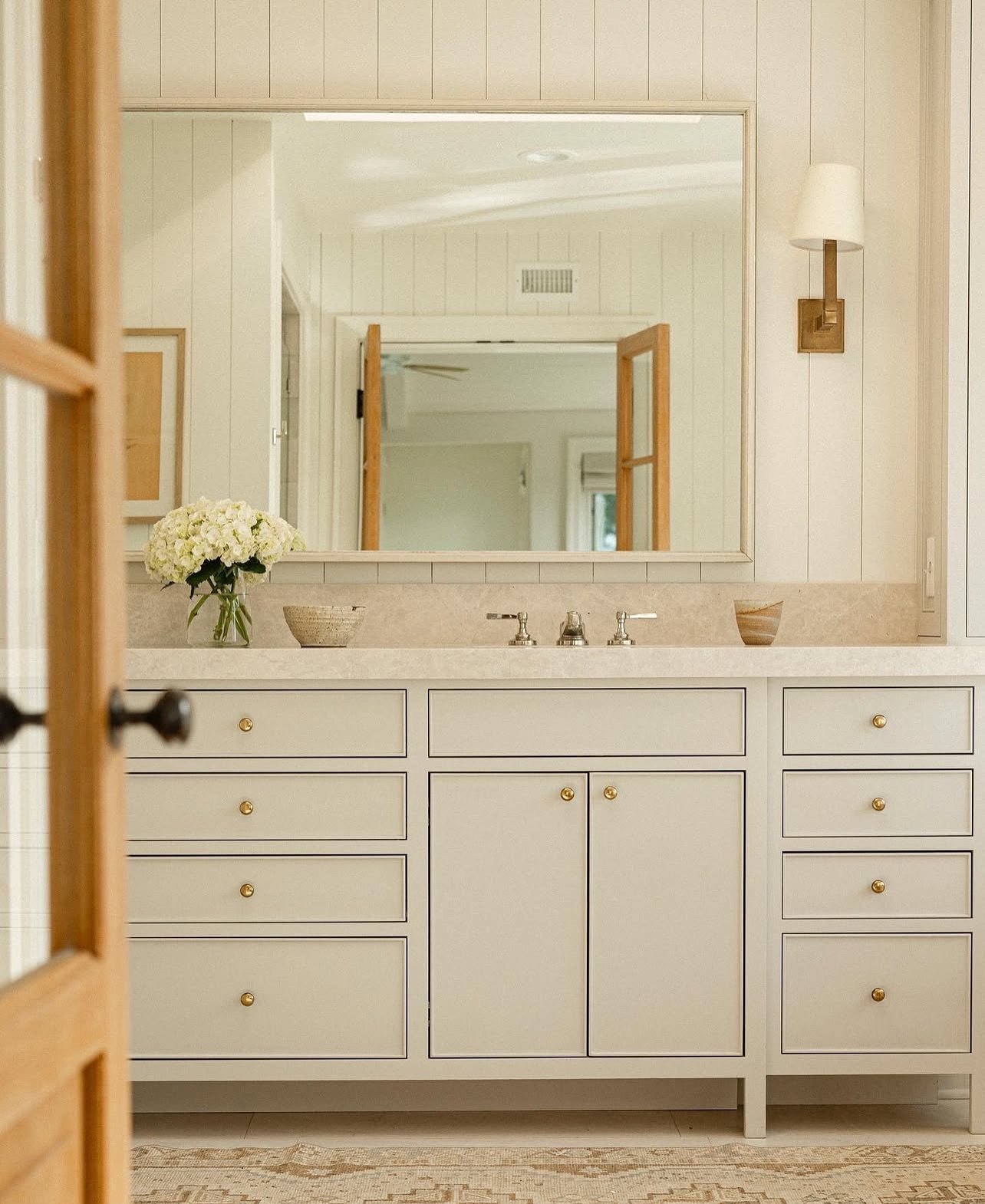 Design details from the en-suite primary bathroom at our Project Bentwood. We loved how much beautiful natural light this space got throughout the day &mdash; always a big plus in our books when it comes to nailing the layout of bathrooms. 

Photogra